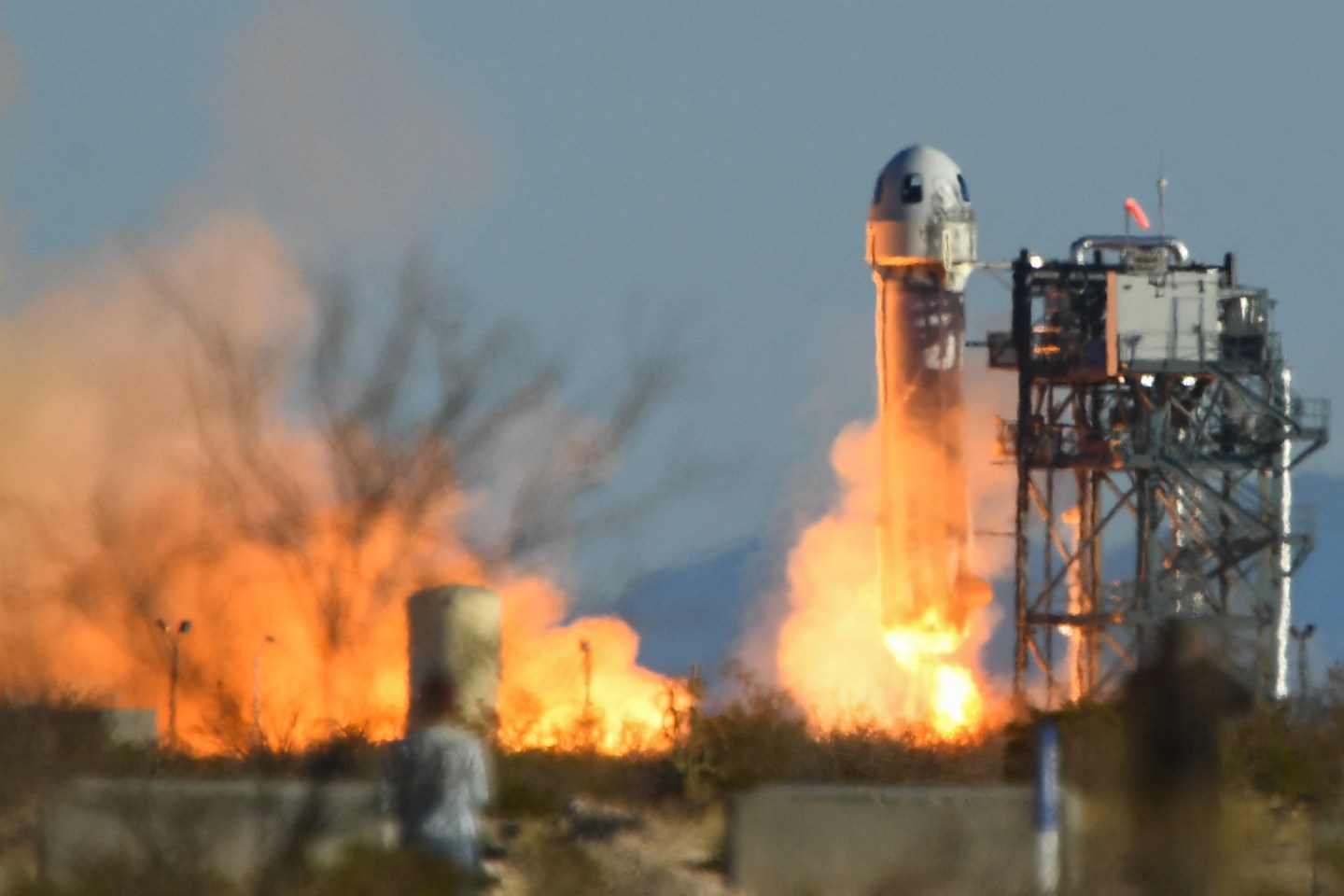 A Blue Origin New Shepard rocket launches from Launch Site One in West Texas north of Van Horn on March 31, 2022.