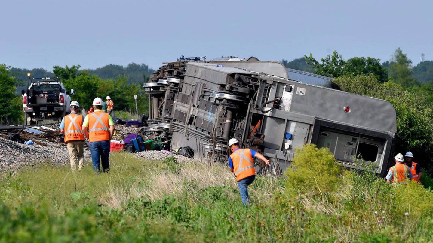 Several cars of an Amtrak train traveling from Los Angeles to Chicago derailed after it struck a dump truck at a crossing in northern Missouri