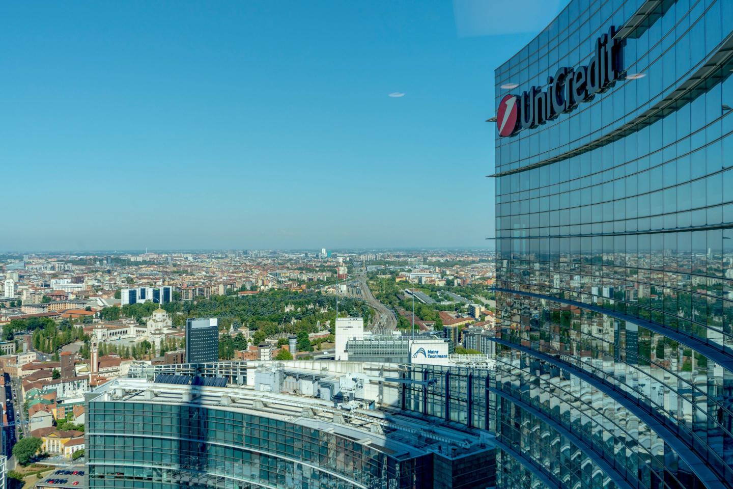 Side view of UniCredit bank tower and the rest of the city