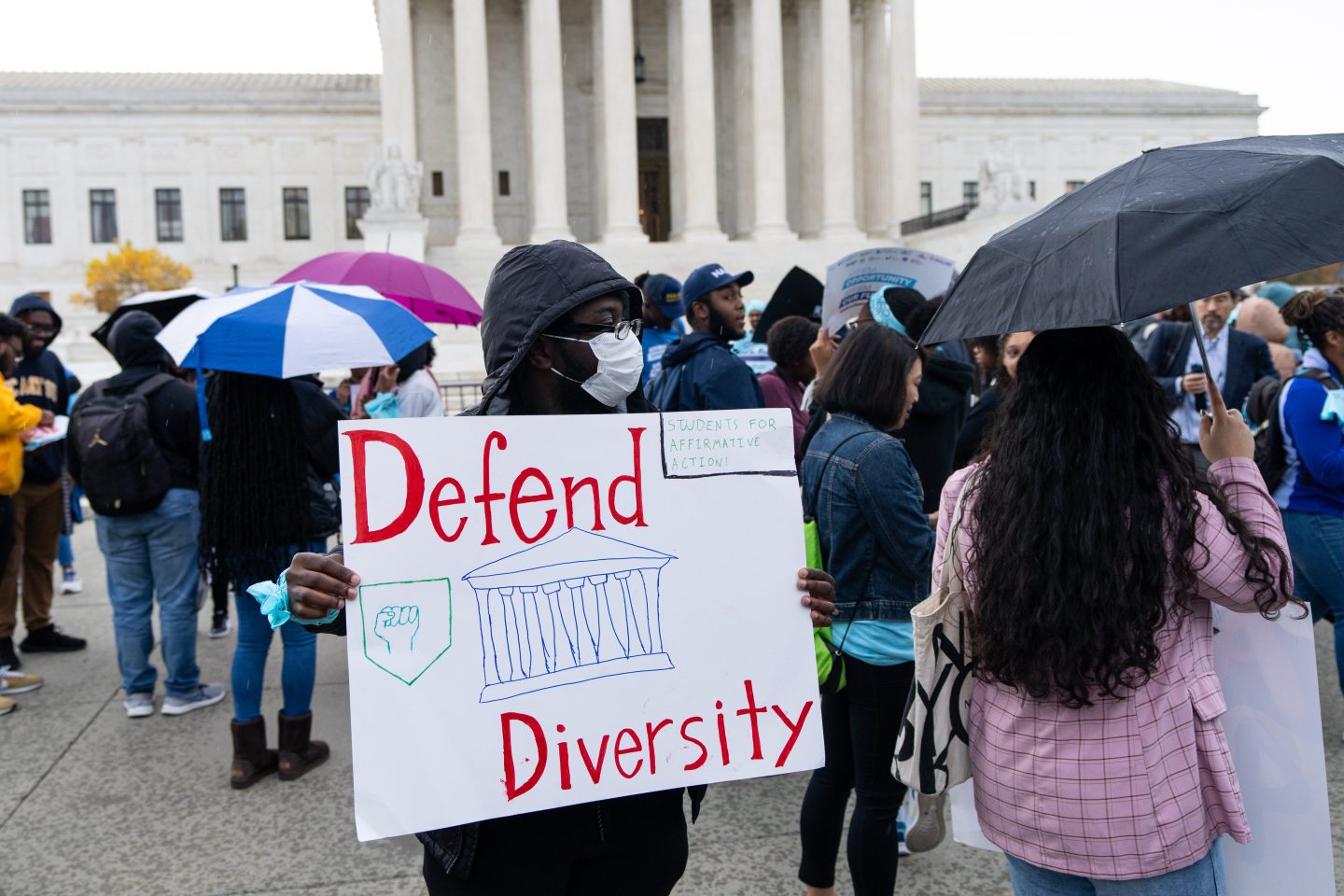 Protesters gather in front of the U.S. Supreme Court as affirmative action cases involving Harvard and University of North Carolina admissions are heard by the court in Washington on Monday, October 31, 2022.