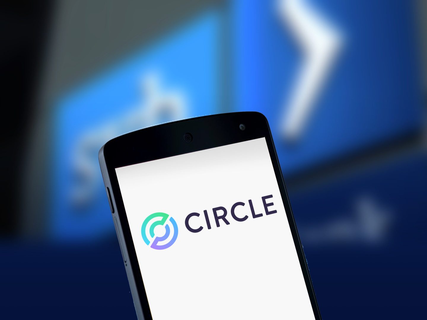 Circle logo on a smartphone screen.