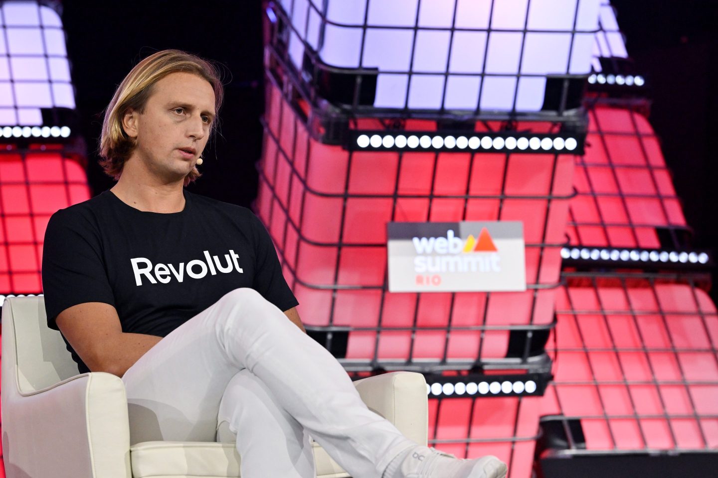 Nik Storonsky speaks on stage at a conference in Brazil.