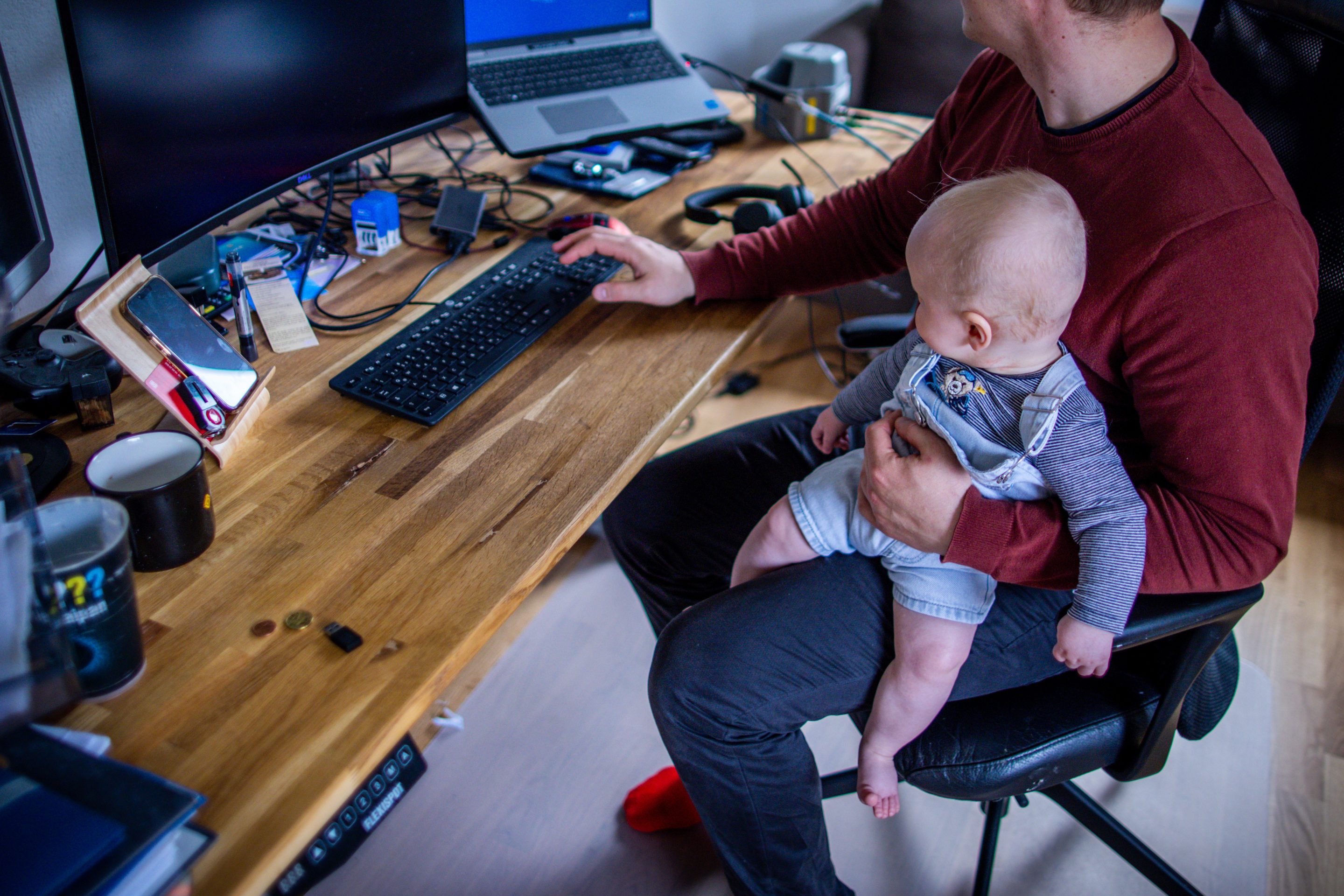 Some companies are defying the return to office push and letting workers stay at home. 