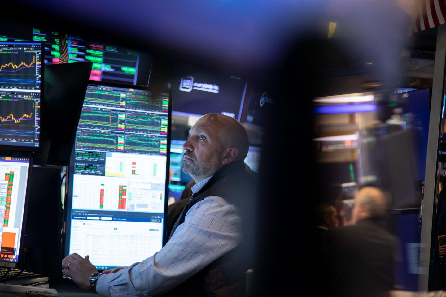 A trader works on the floor of the New York Stock Exchange (NYSE) in New York, US, on Friday, June 9, 2023.