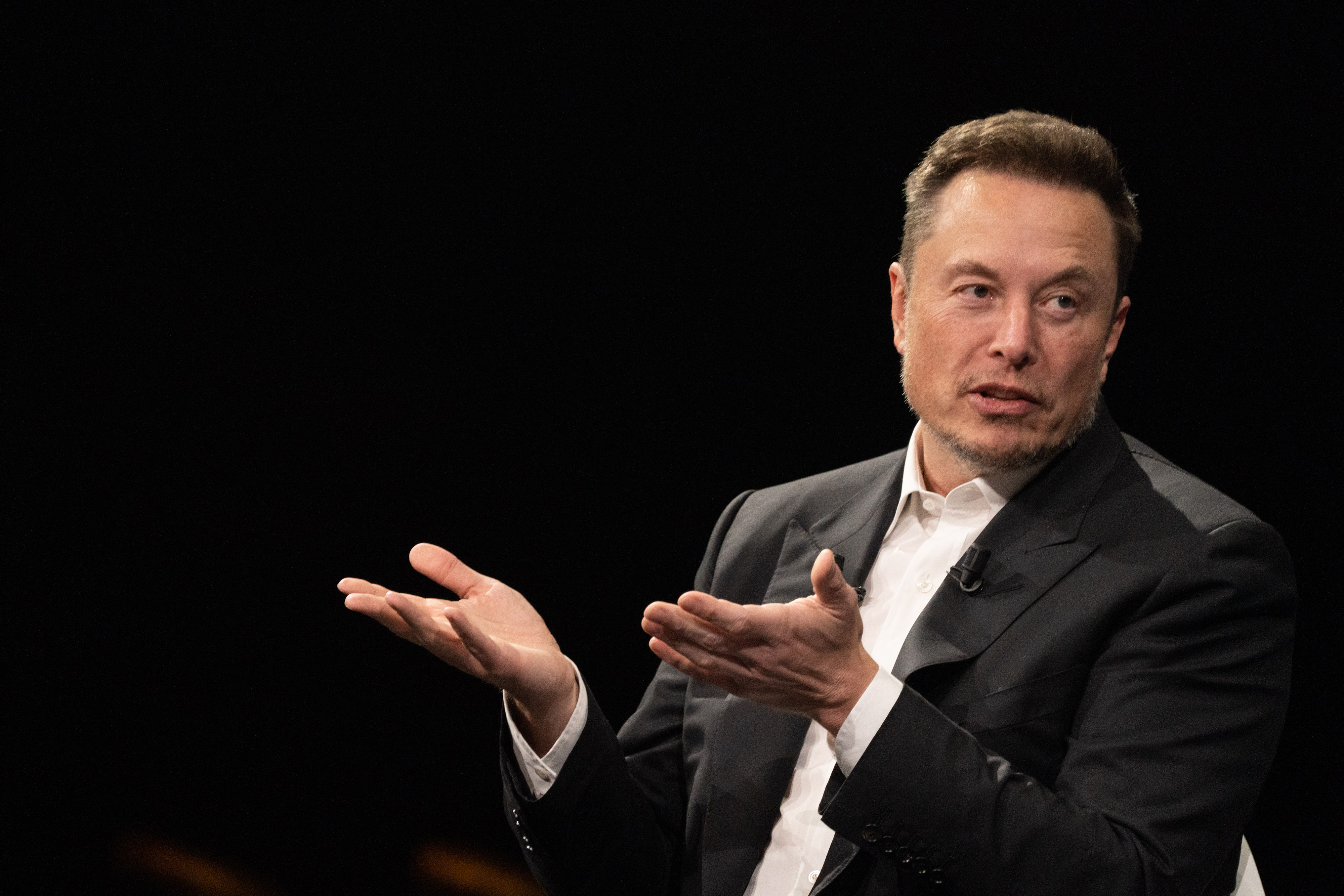 Tesla investors to get $12K for Elon Musk's false tweet | Fortune