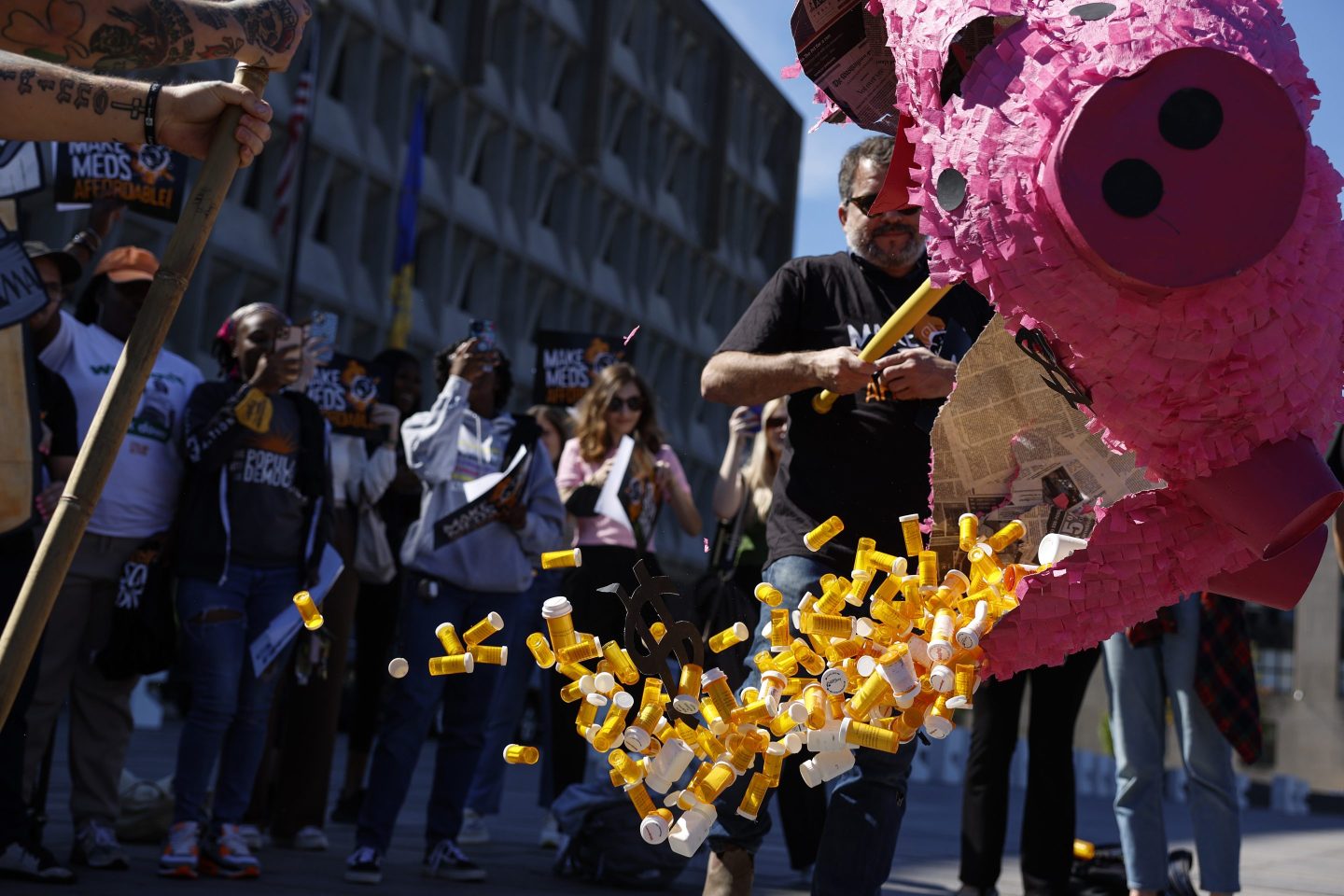 Activists protest against the price of prescription drugs in front of the U.S. Department of Health and Human Services (HHS) on Oct. 6, 2022 in Washington, DC.