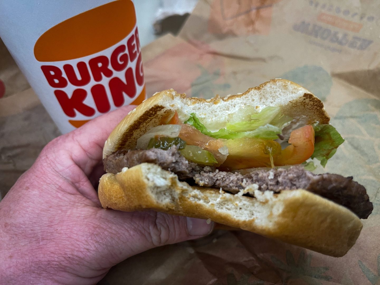 A class action lawsuit claims Burger King’s ads overstate the amount of meat in its Whopper burger and other sandwiches.