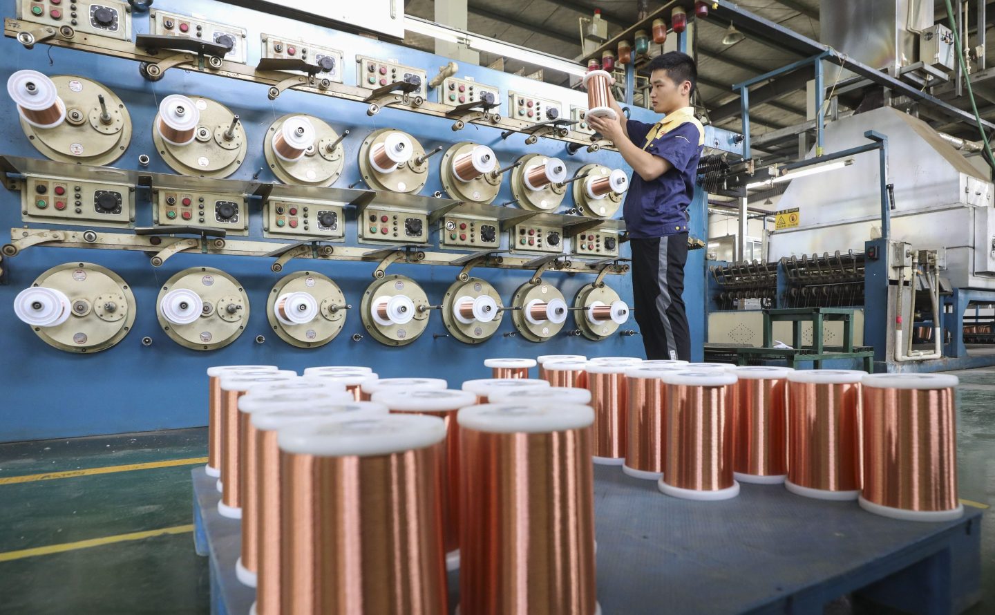 An employee manufactures copper wires at a factory in Huai’an, Jiangsu Province, China, June 2023.