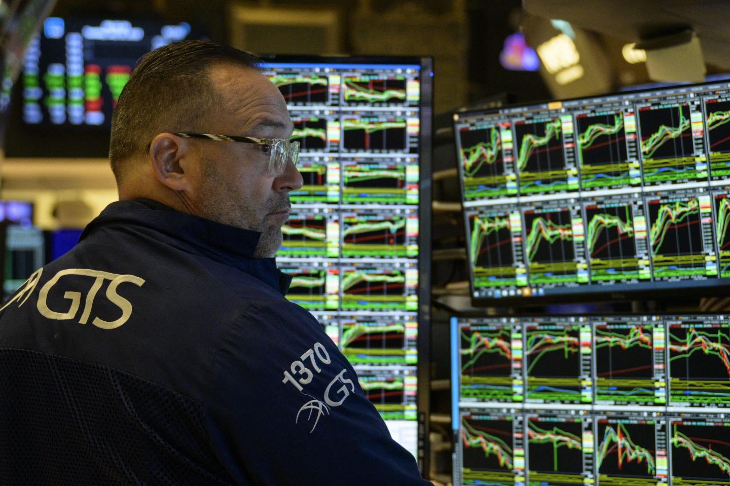 A worker at the New York Stock Exchange on July 25, 2023