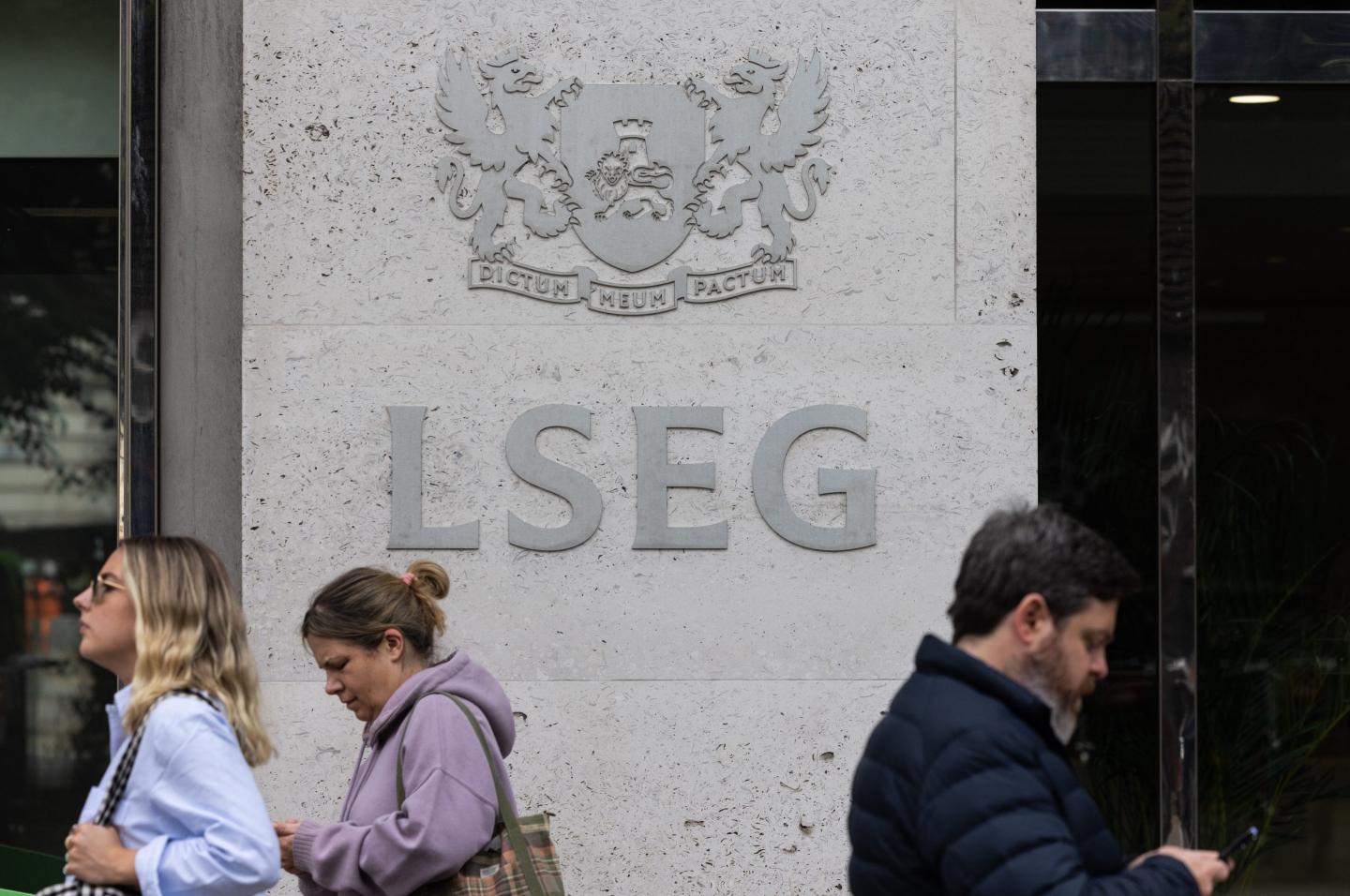 People walking outside the London Stock Exchange