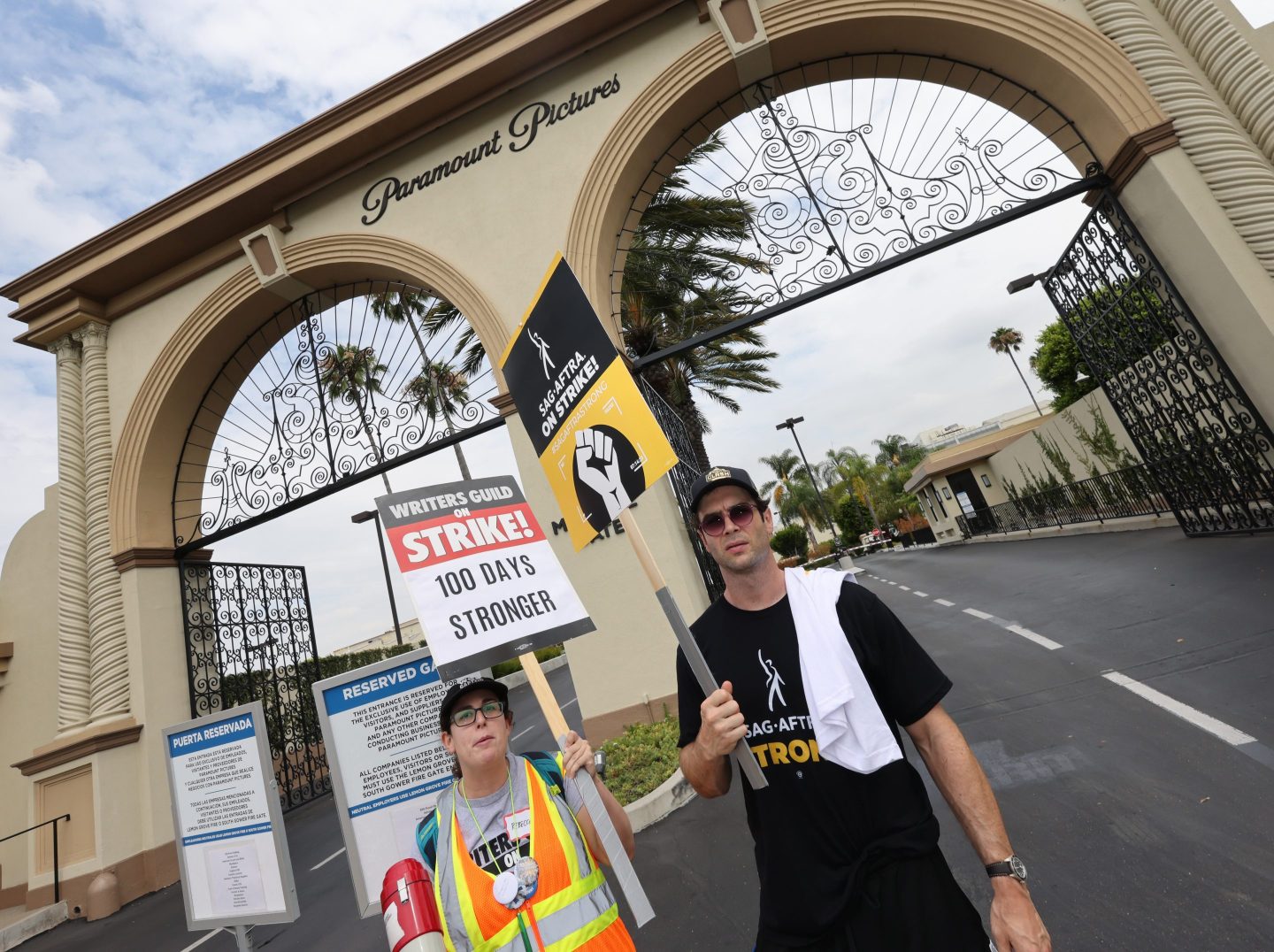 Striking screen writers and actors outside the studio of Paramount Pictures.