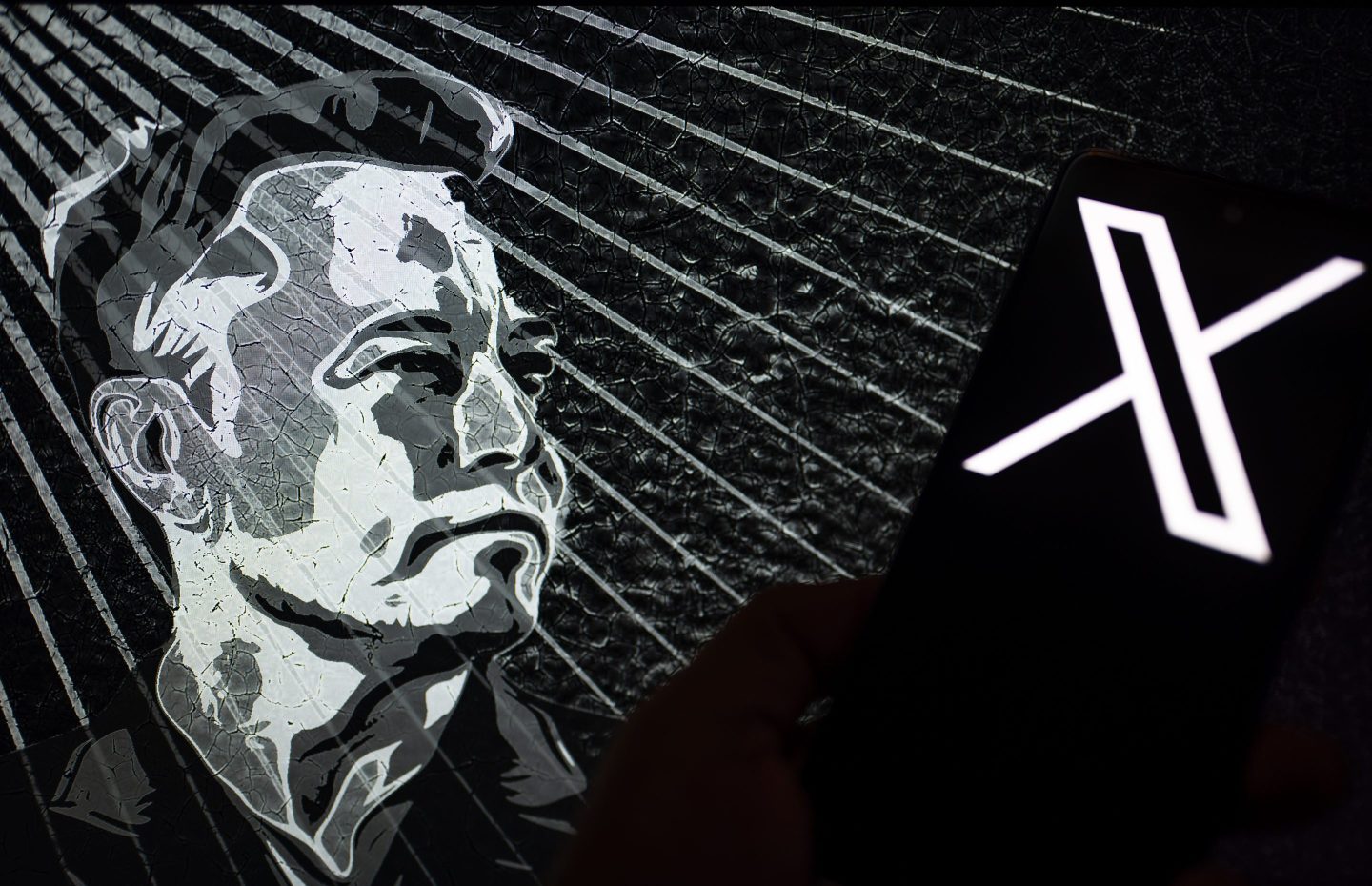 The new (Twitter) logo rebranded as X displayed on mobile with Elon Musk in the background