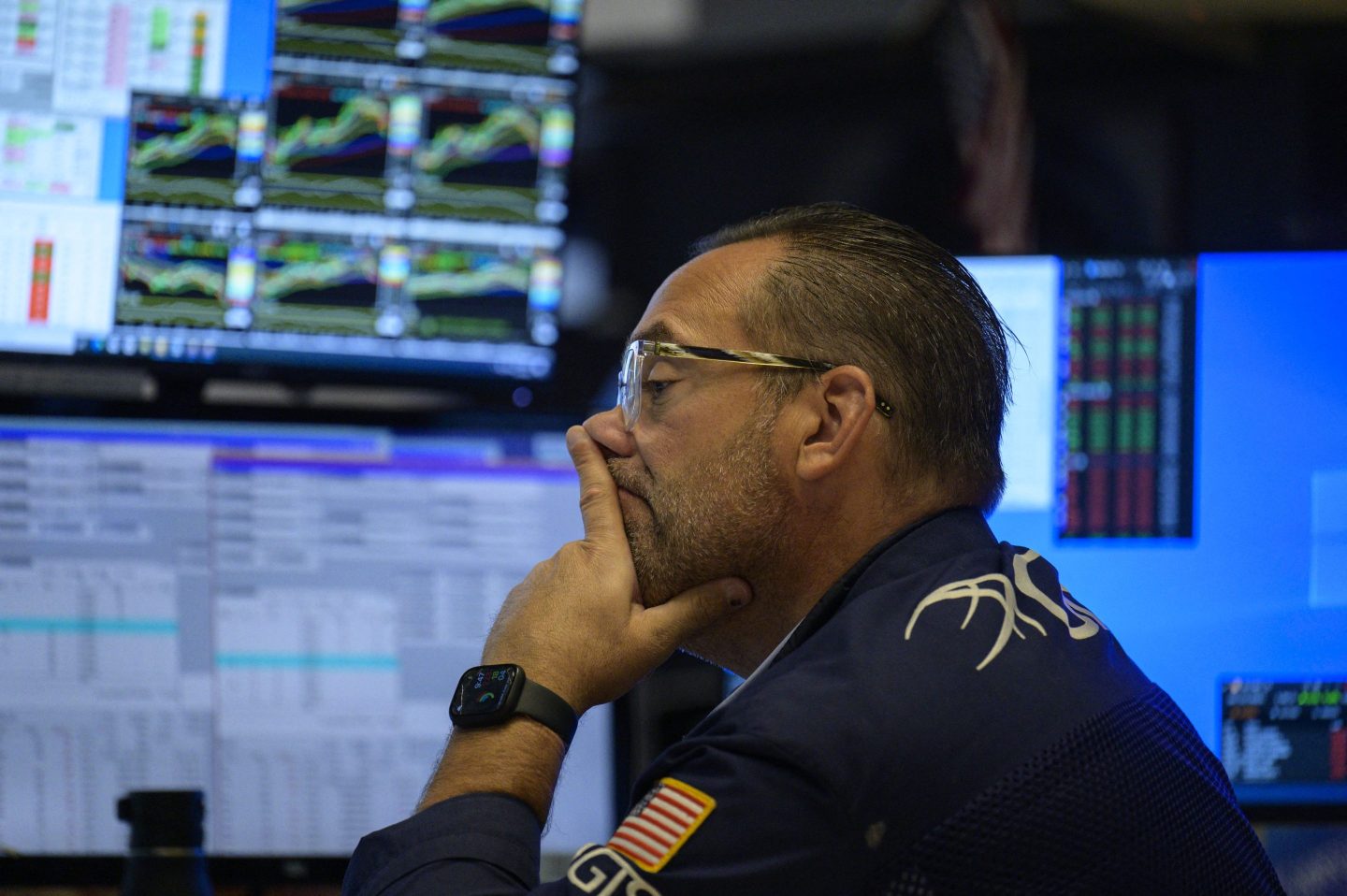 A trader works on the floor of the New York Stock Exchange, August 21, 2023.