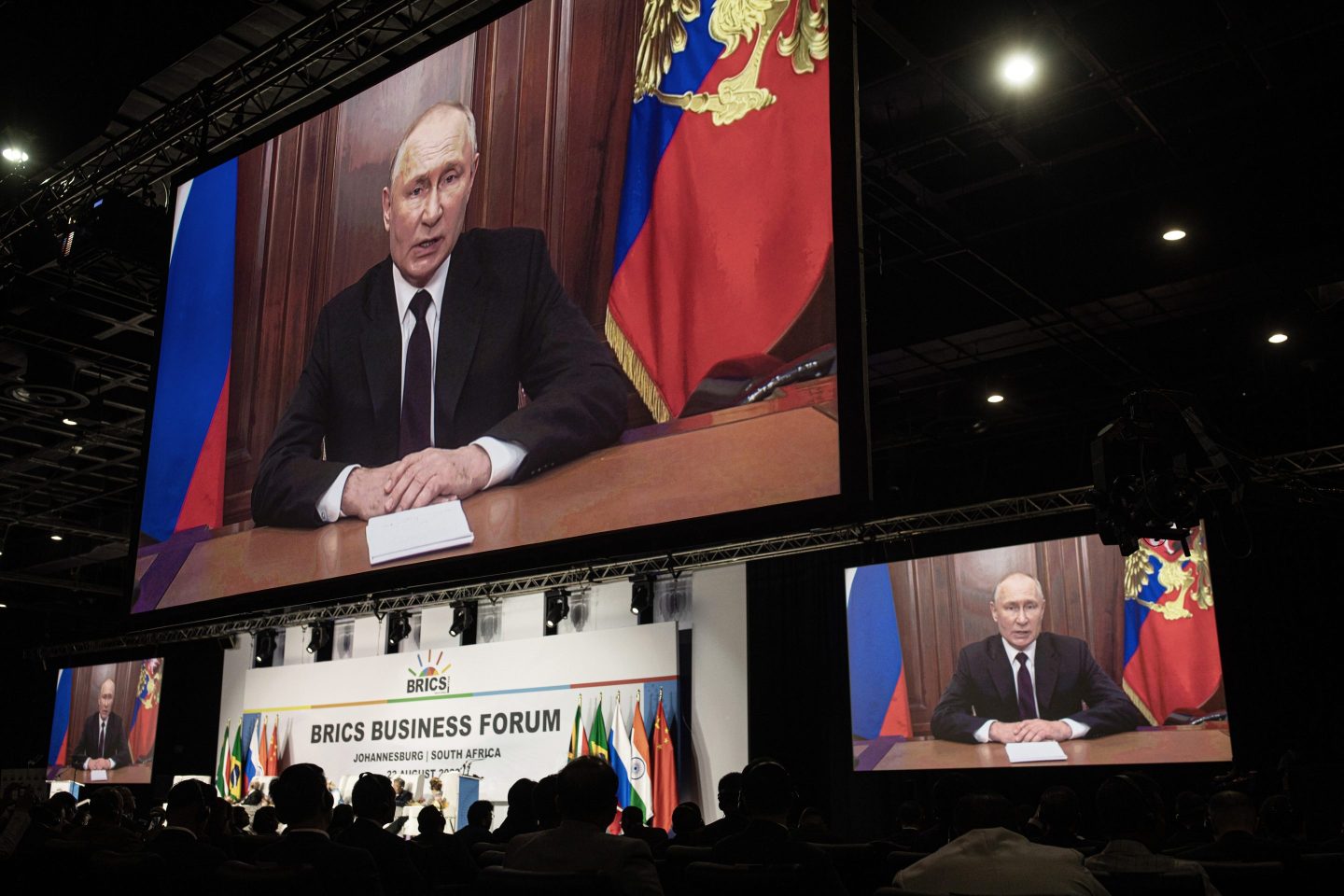 Russian President Vladimir Putin speaks to the BRICS business summit via a prerecorded video on August 22, 2023, in Johannesburg, South Africa.