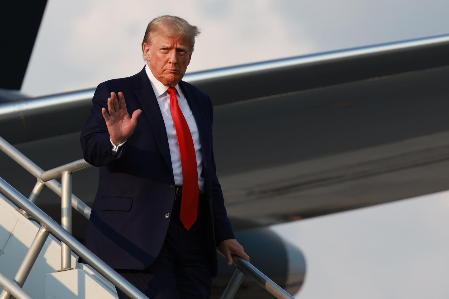 Donald Trump surrenders at Atlanta jail on charges he tried to overturn his election loss—and to take a historic mug shot