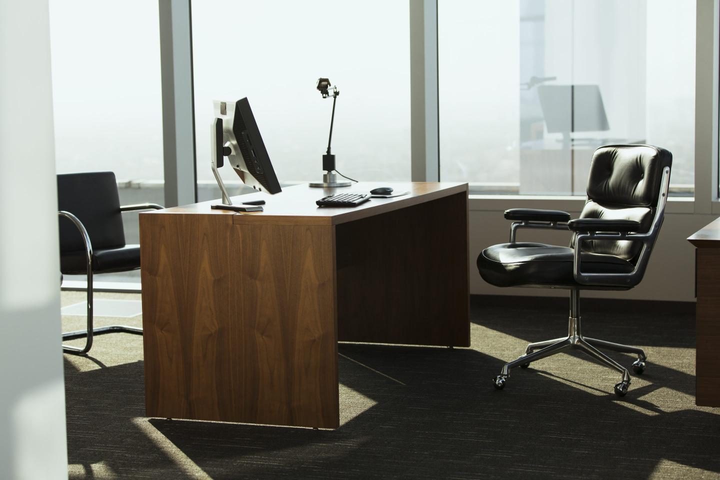 Photo of an empty desk in an office