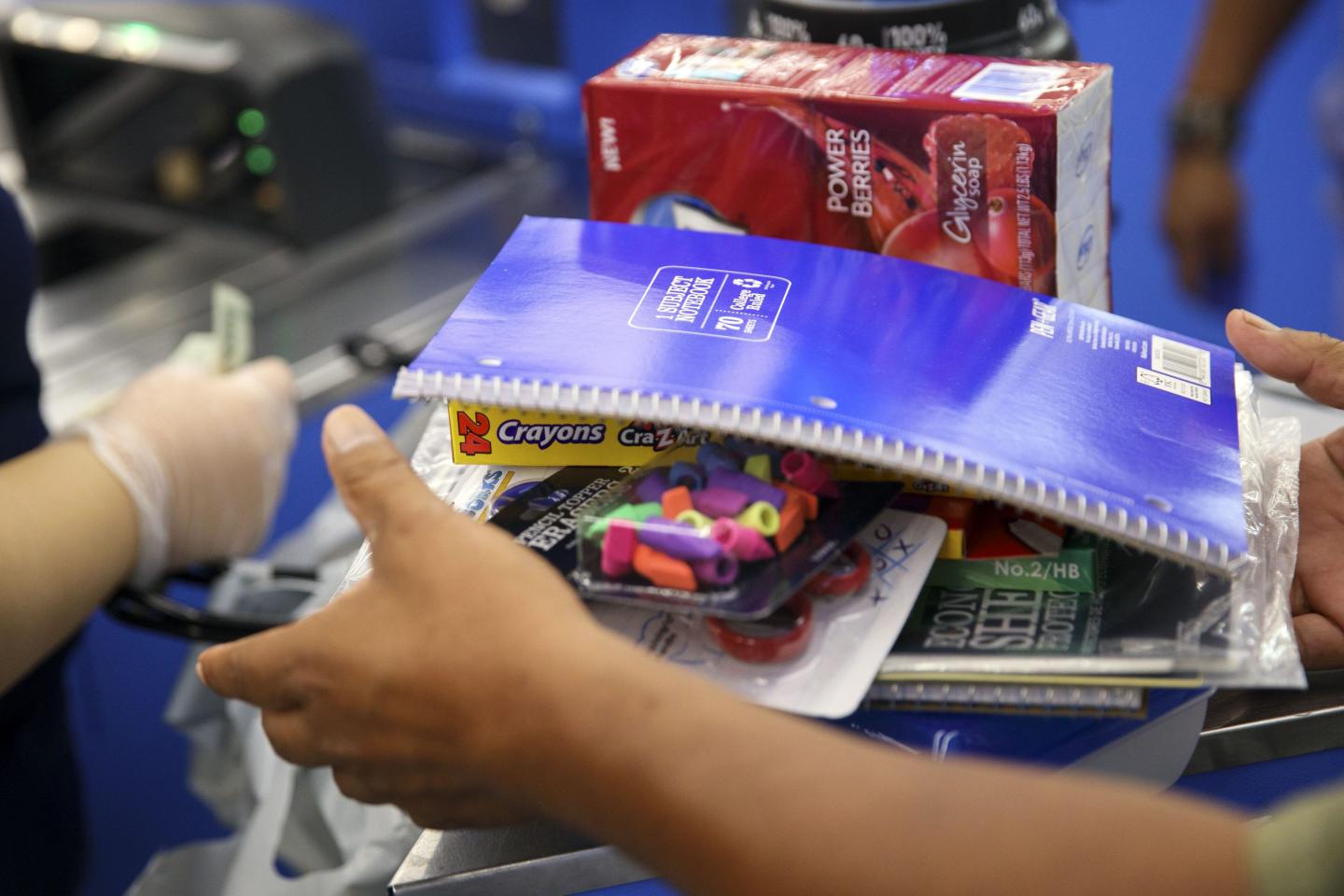 School supplies are bagged at a cash register in Burbank, California.