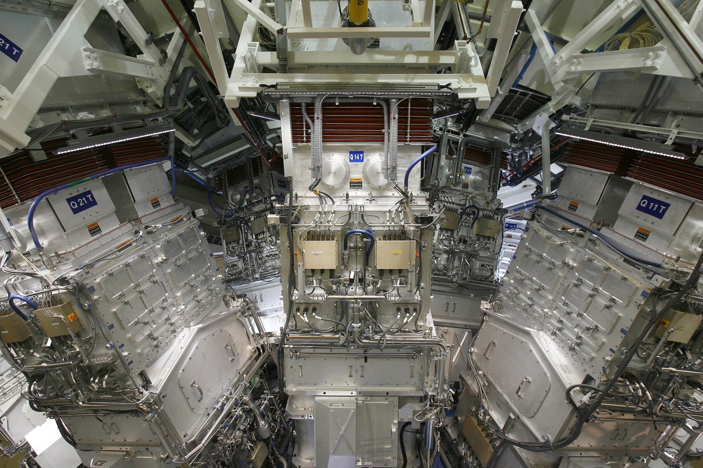 Optics connect to the exterior of the target chamber inside the National Ignition Facility (NIF) at the Lawrence Livermore National Laboratory in Livermore, California.