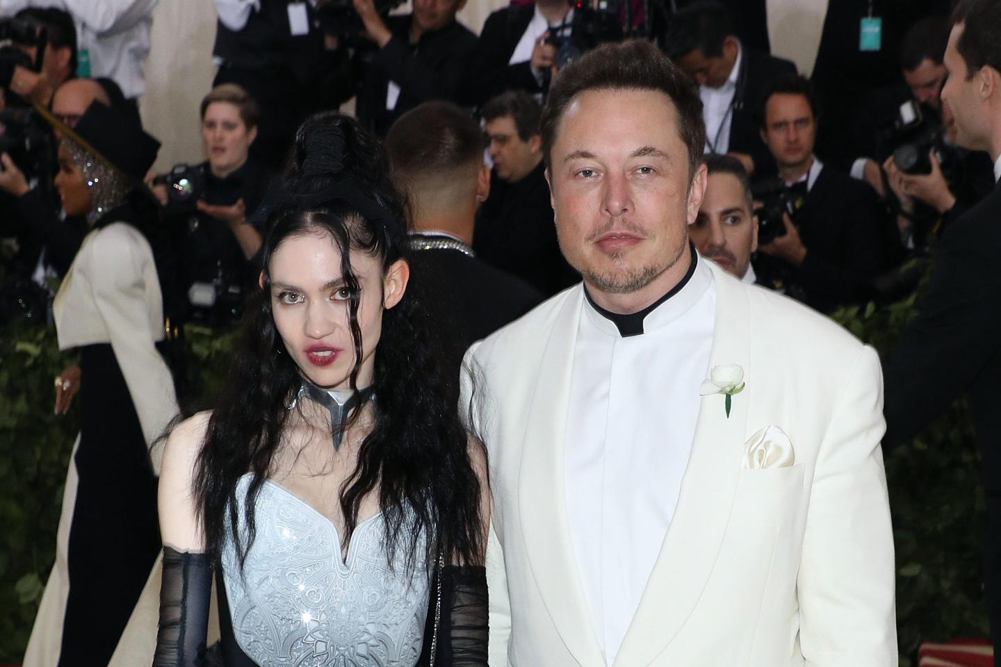 Grimes and Elon Musk attend "Heavenly Bodies: Fashion & the Catholic Imagination", the 2018 Costume Institute Benefit at Metropolitan Museum of Art on May 7, 2018 in New York City.