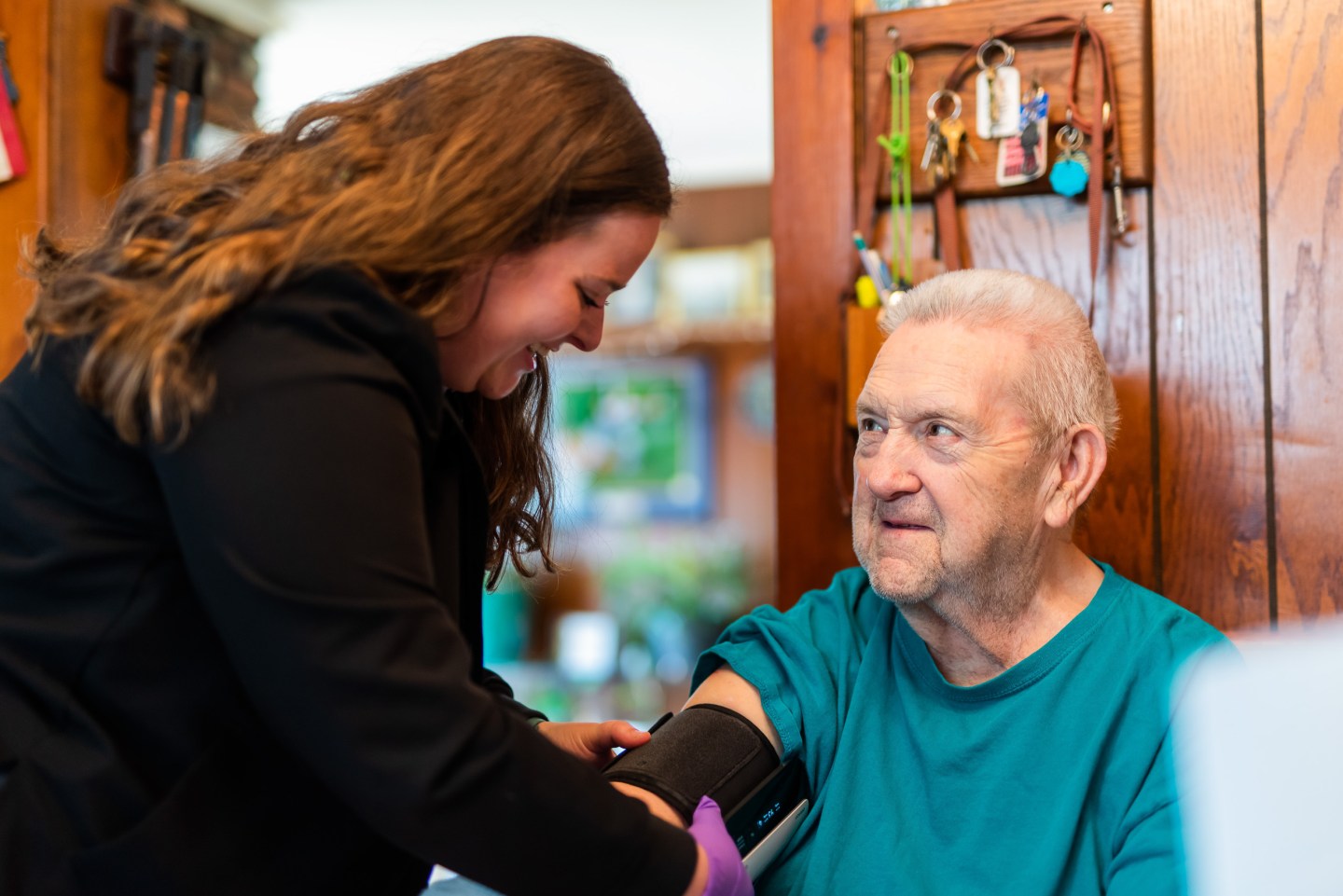 Patient George Hardy with Eryn McCormack, RN, BSN, a nurse in the Home Hospital program.