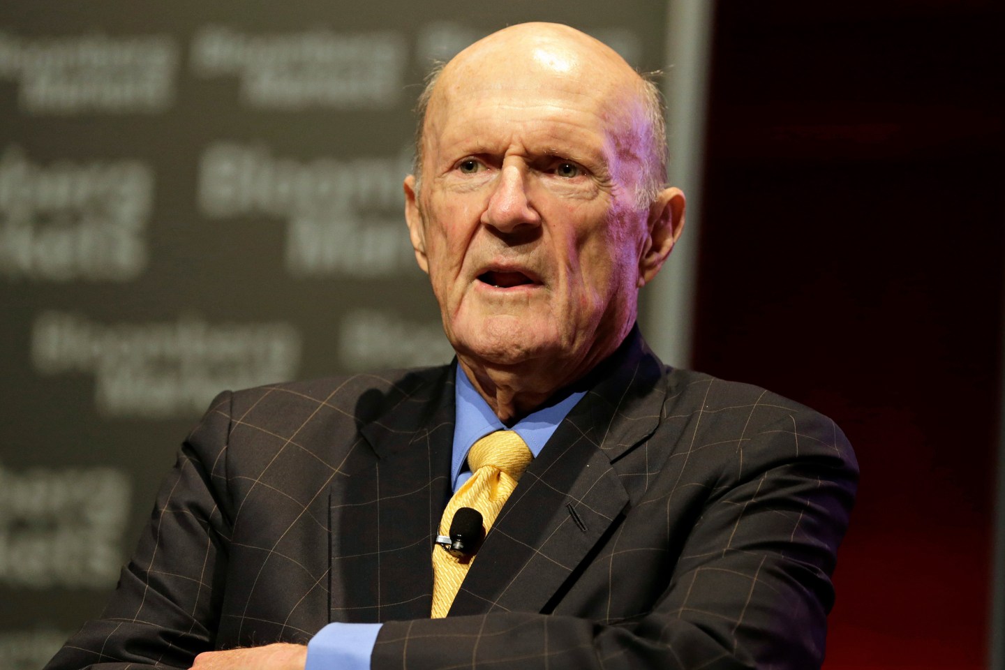elderly man in suit and tie