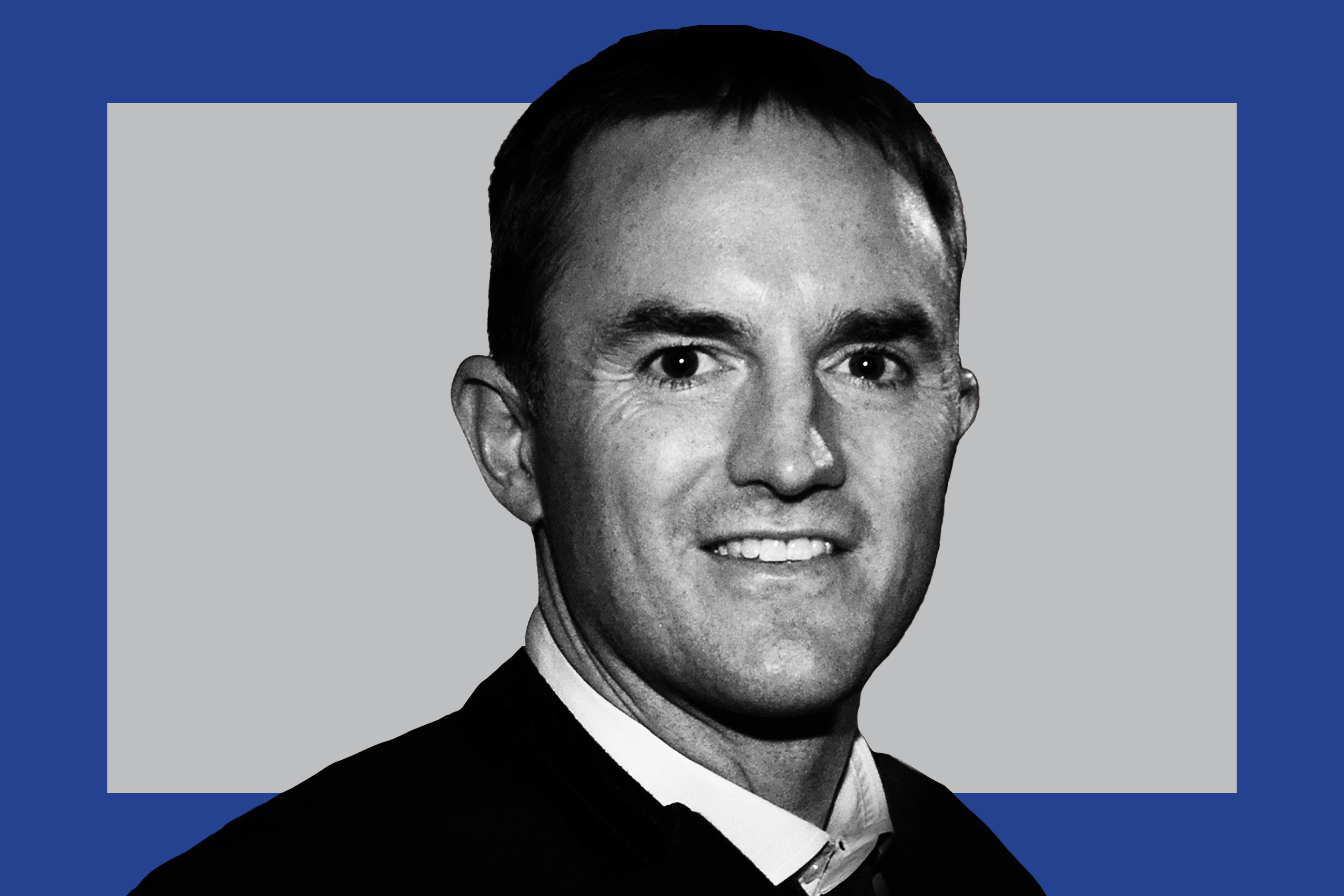 man in professional clothing, smiling