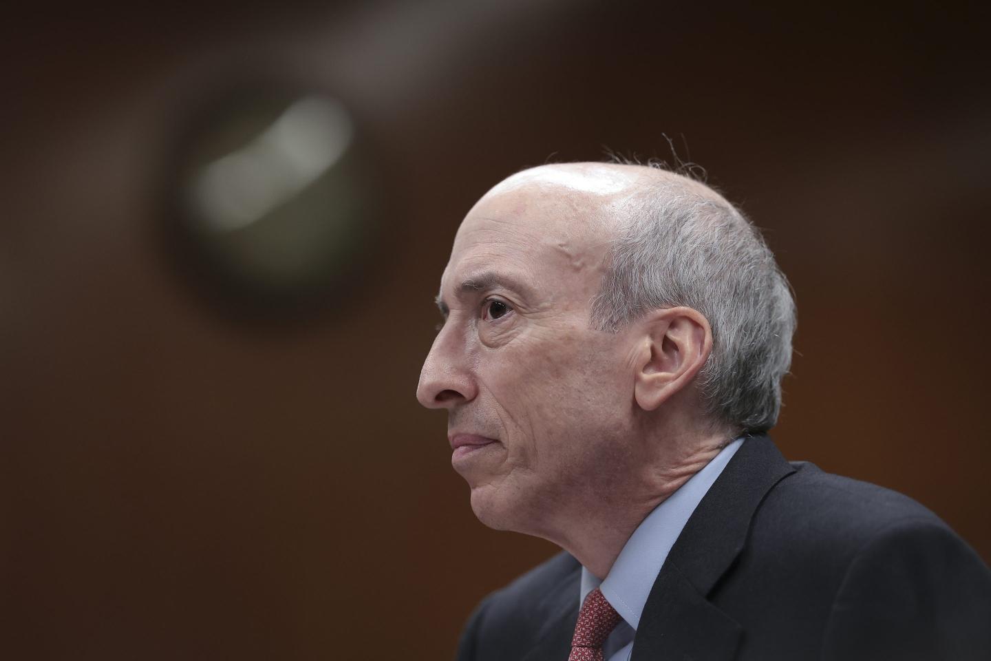 Side profile view of man in suit and tie