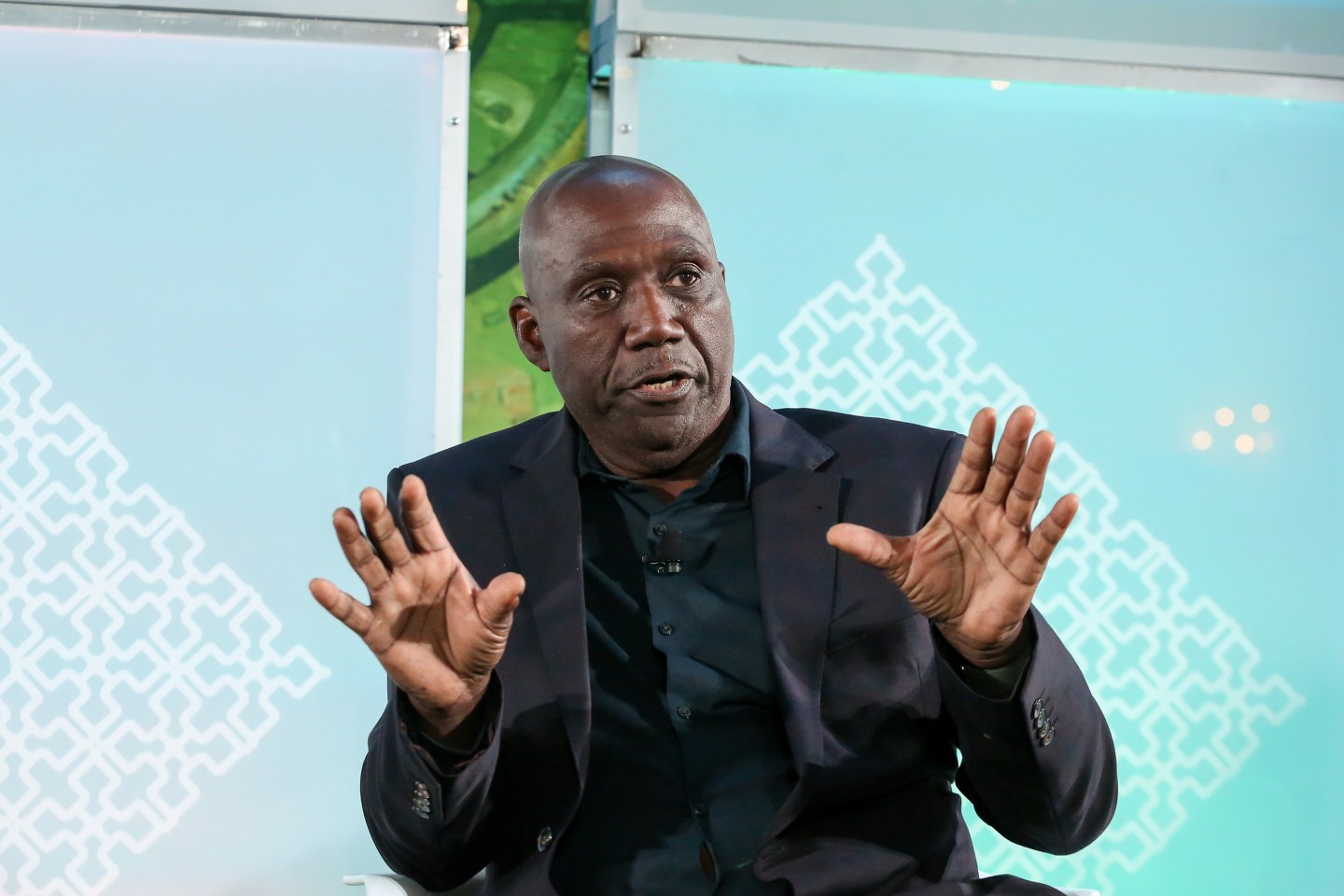 Photo of Roosevelt Giles on stage at Fortune's Impact Initiative 2023 conference