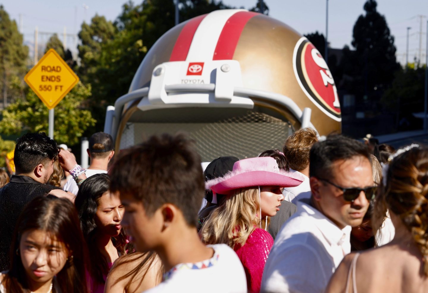 Fans wait to go through security before Taylor Swift performs at Levi's Stadium in Santa Clara, Calif., on July 28, 2023.