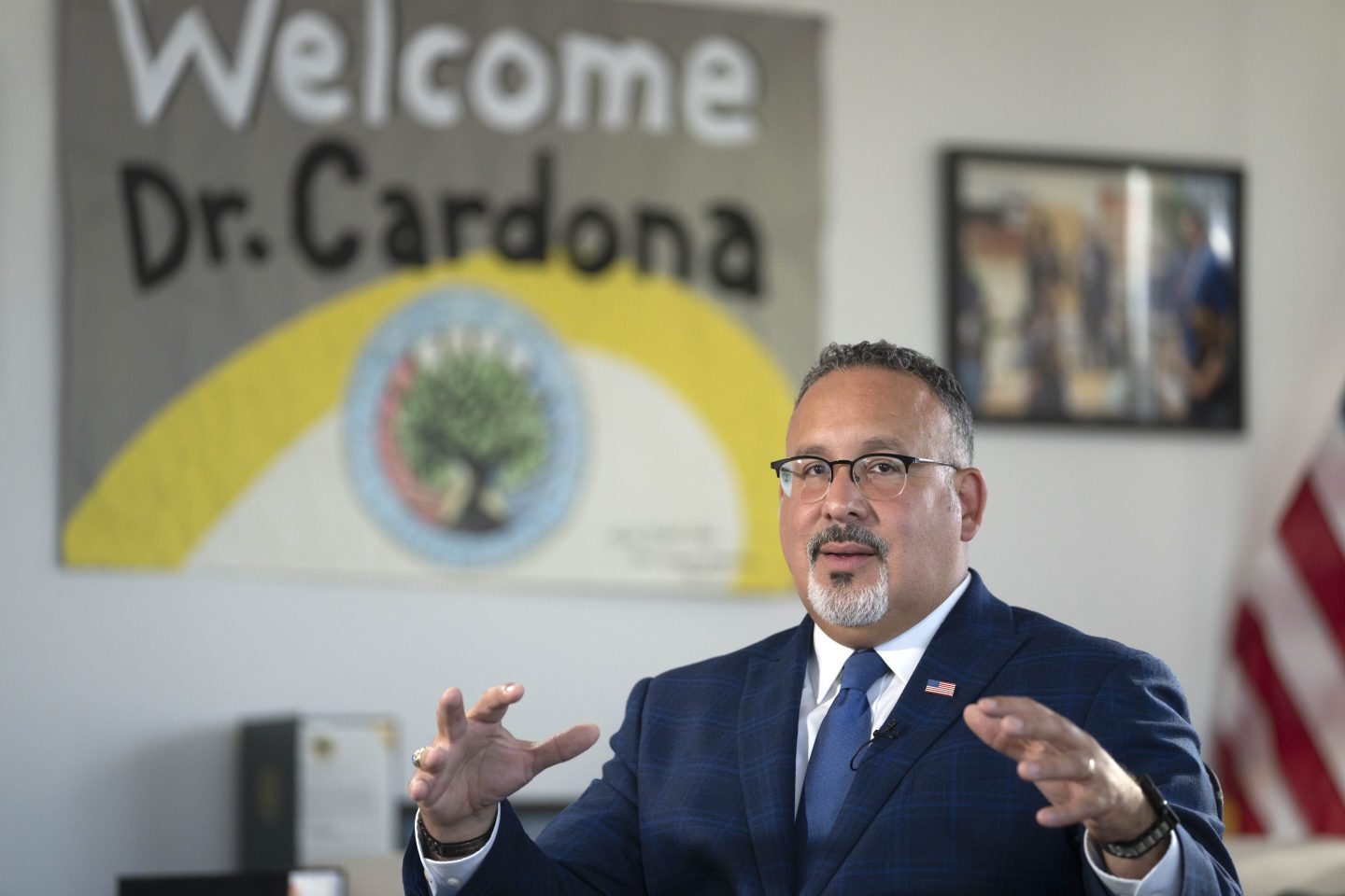 Education Secretary Miguel Cardona speaks during an interview in his office at the Department of Education, on Sept. 20, 2023 in Washington.