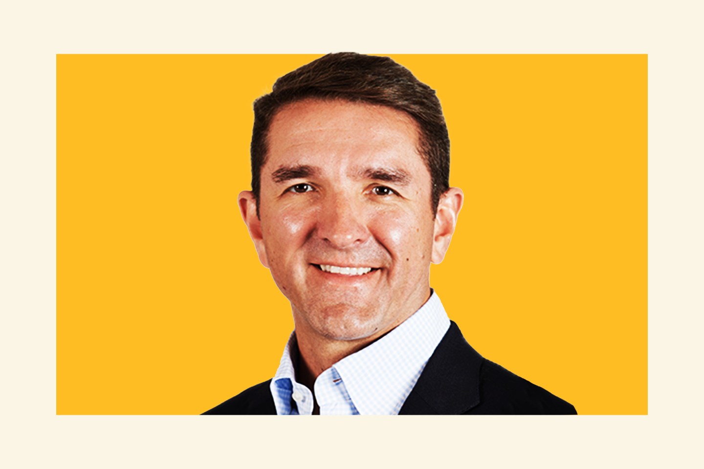 man in suit and tie smiling