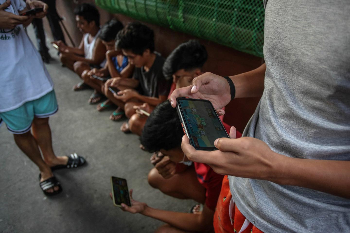 Playing the crypto game Axie Infinity in the Philippines in 2021.