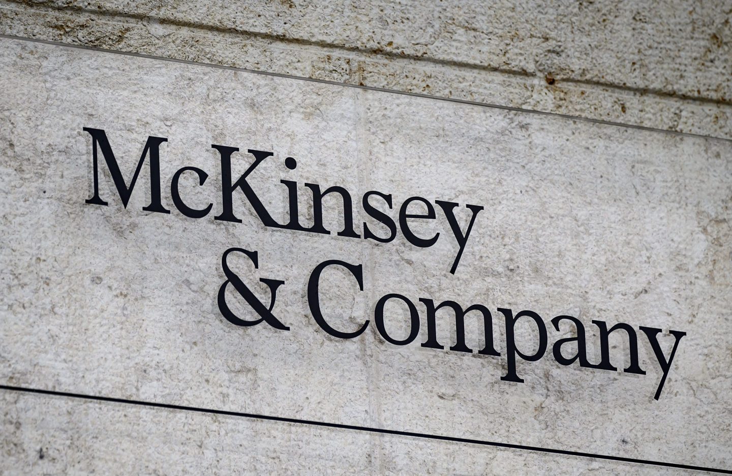 This photograph taken on April 12, 2022, shows a sign of US-based McKinsey &amp; Company management consulting firm in Geneva. (Photo by Fabrice COFFRINI / AFP) (Photo by FABRICE COFFRINI/AFP via Getty Images)