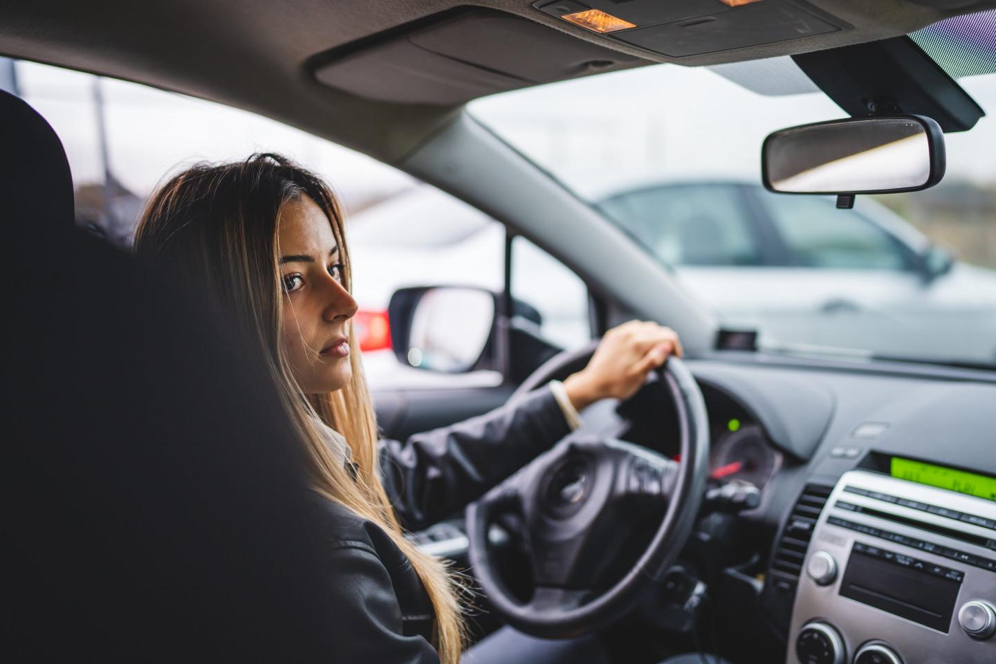 woman driving car