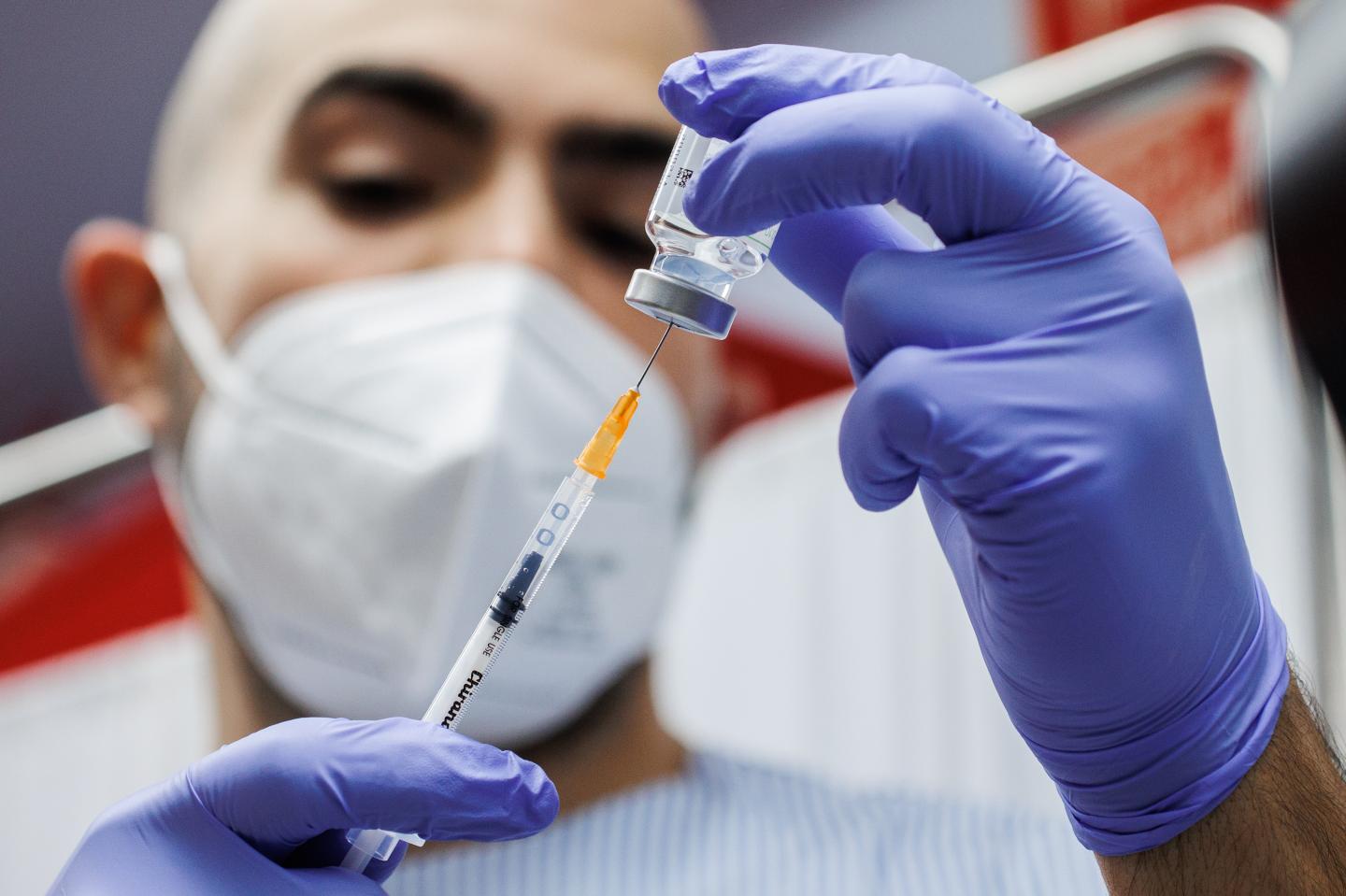 Moderna’s updated COVID vaccine helps fight against a new strain, study shows, and may be approved for use as soon as Friday