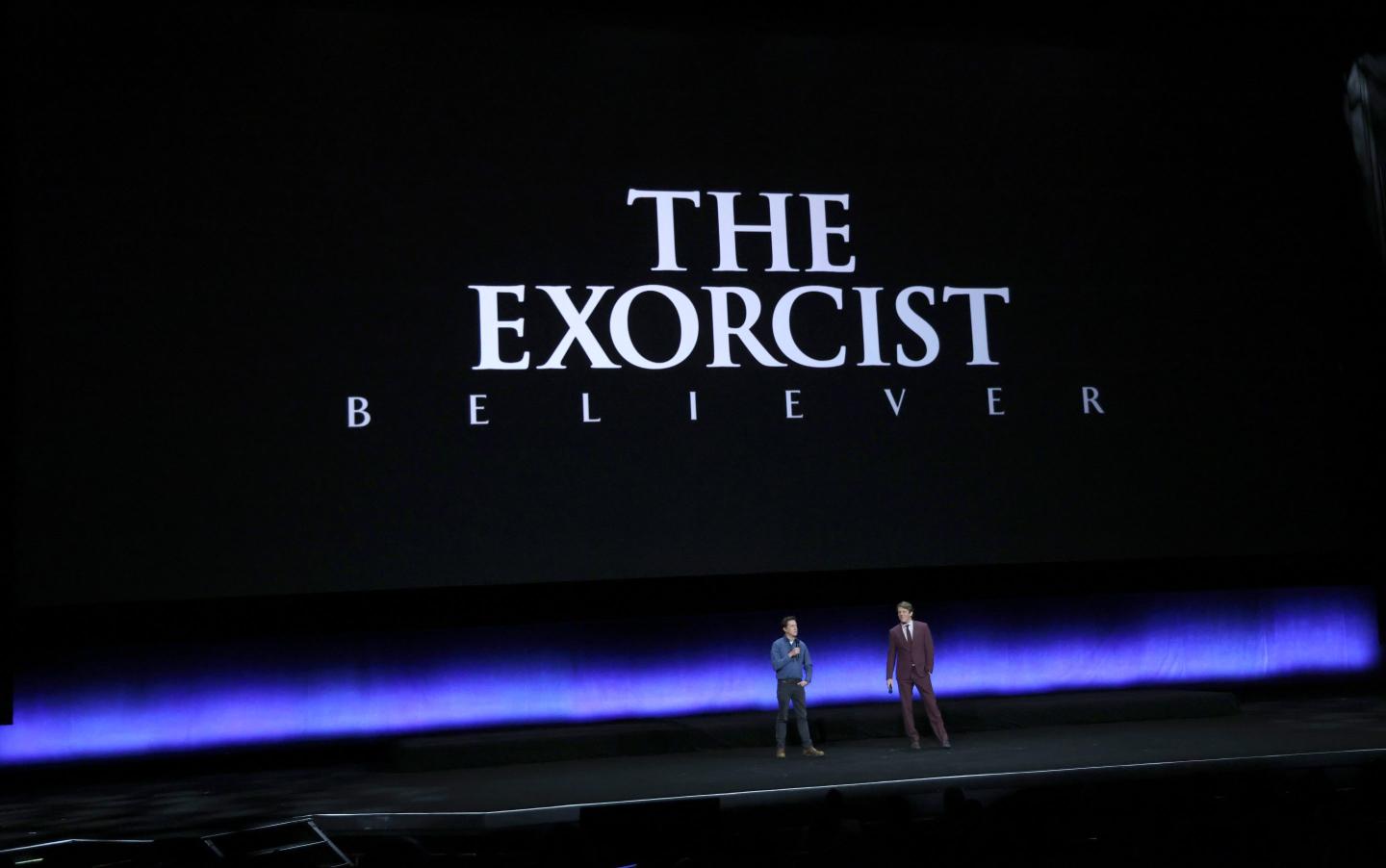 LAS VEGAS, NEVADA - APRIL 26:  David Gordon Green (L) and Jason Blum speak onstage as they promote the upcoming film "The Exorcist: Believer" during the Universal Pictures and Focus Features presentation during CinemaCon, the official convention of the National Association of Theatre Owners.