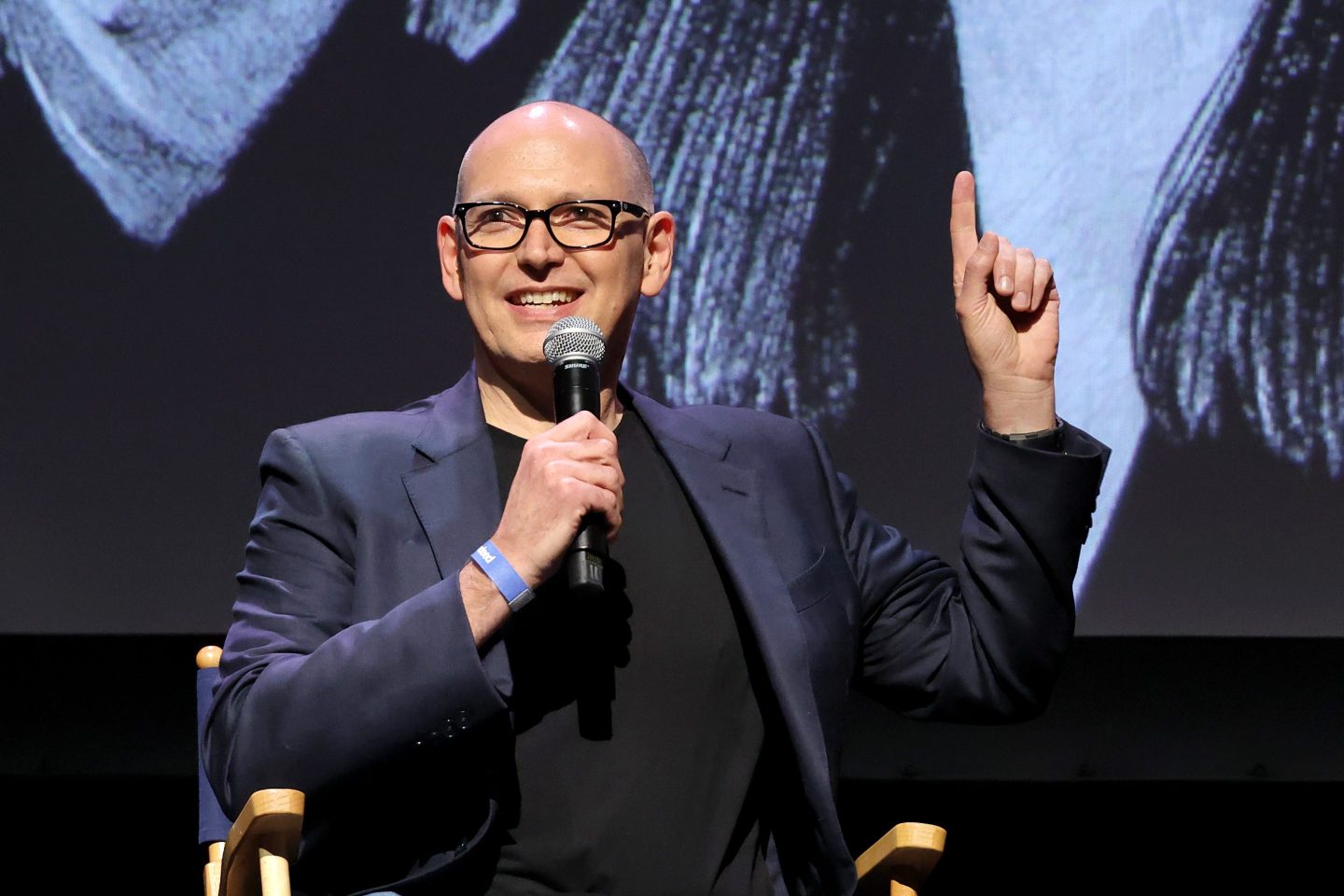 Chris Hyams speaks onstage