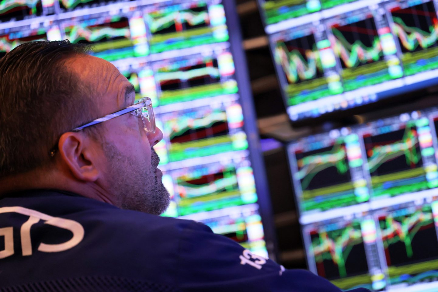 Traders work on the floor of the New York Stock Exchange during morning trading on Aug. 10, 2023, in New York City.