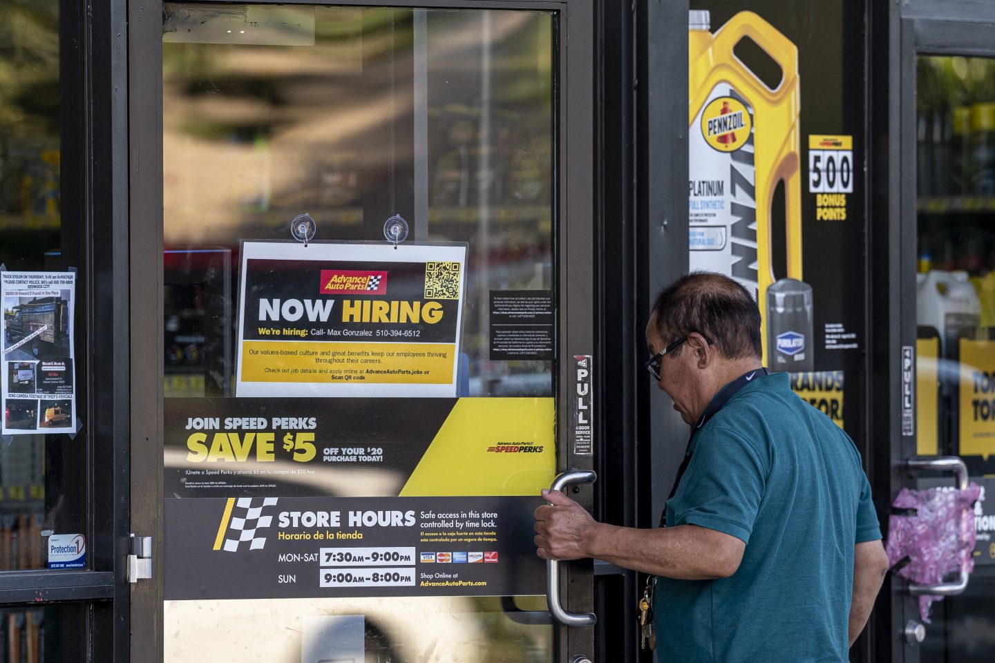 A "Now Hiring" sign at an Advance Auto Parts store in San Leandro, Calif.