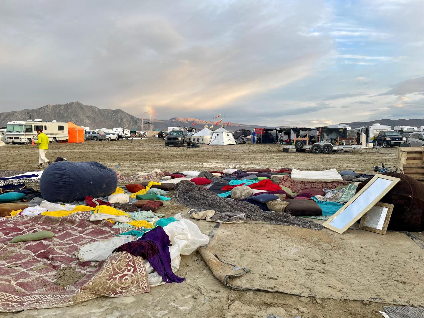 Burning Man organizers have 3 weeks to tidy up an apocalyptic expanse of abandoned cars, furniture, and trash after the festival turned into a mud bog
