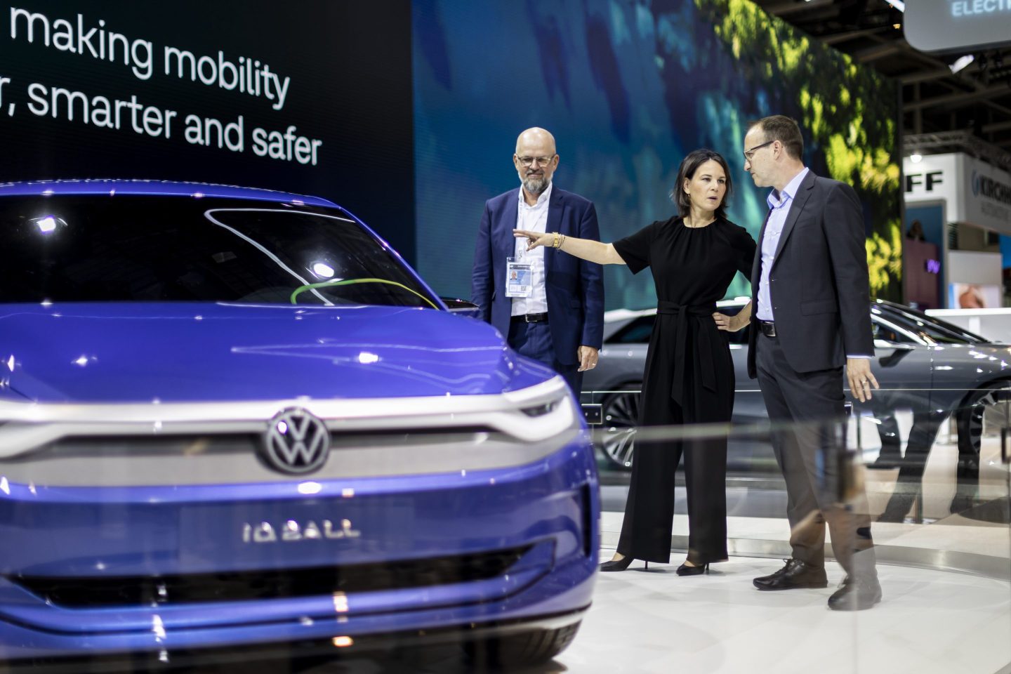 German Federal Foreign Minister Annalena Baerbock visits the Volkswagen booth at the 2023 IAA Mobility car show.