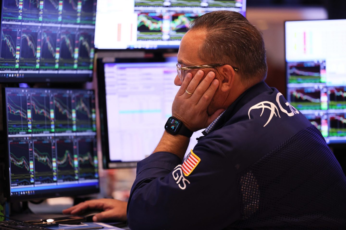 A trader at the New York Stock Exchange