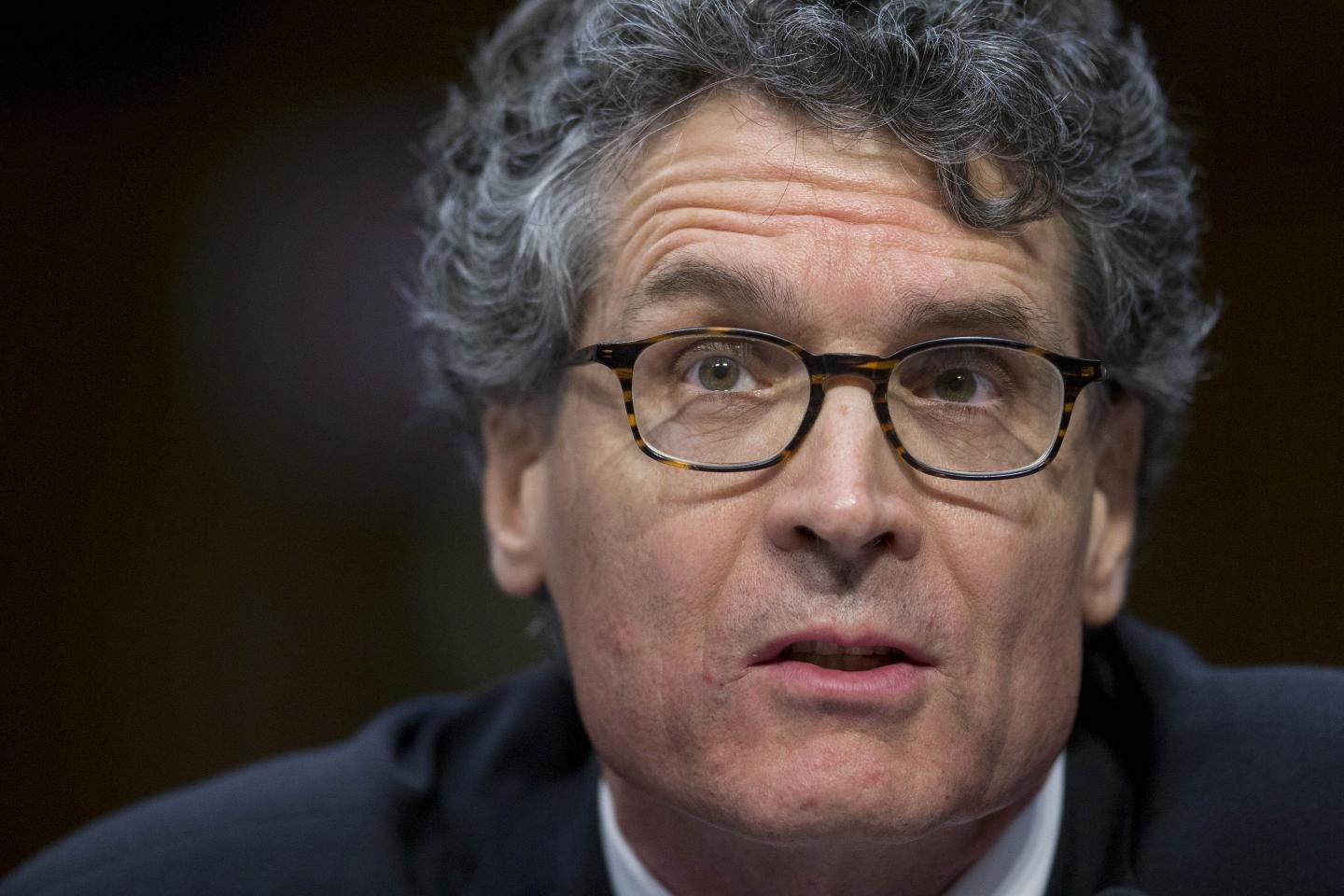 Peter Brown, chief executive officer of Renaissance Technologies LLC, speaks during a Senate Permanent Subcommittee on Investigations hearing in Washington, D.C., U.S., on Tuesday, July 22, 2014.