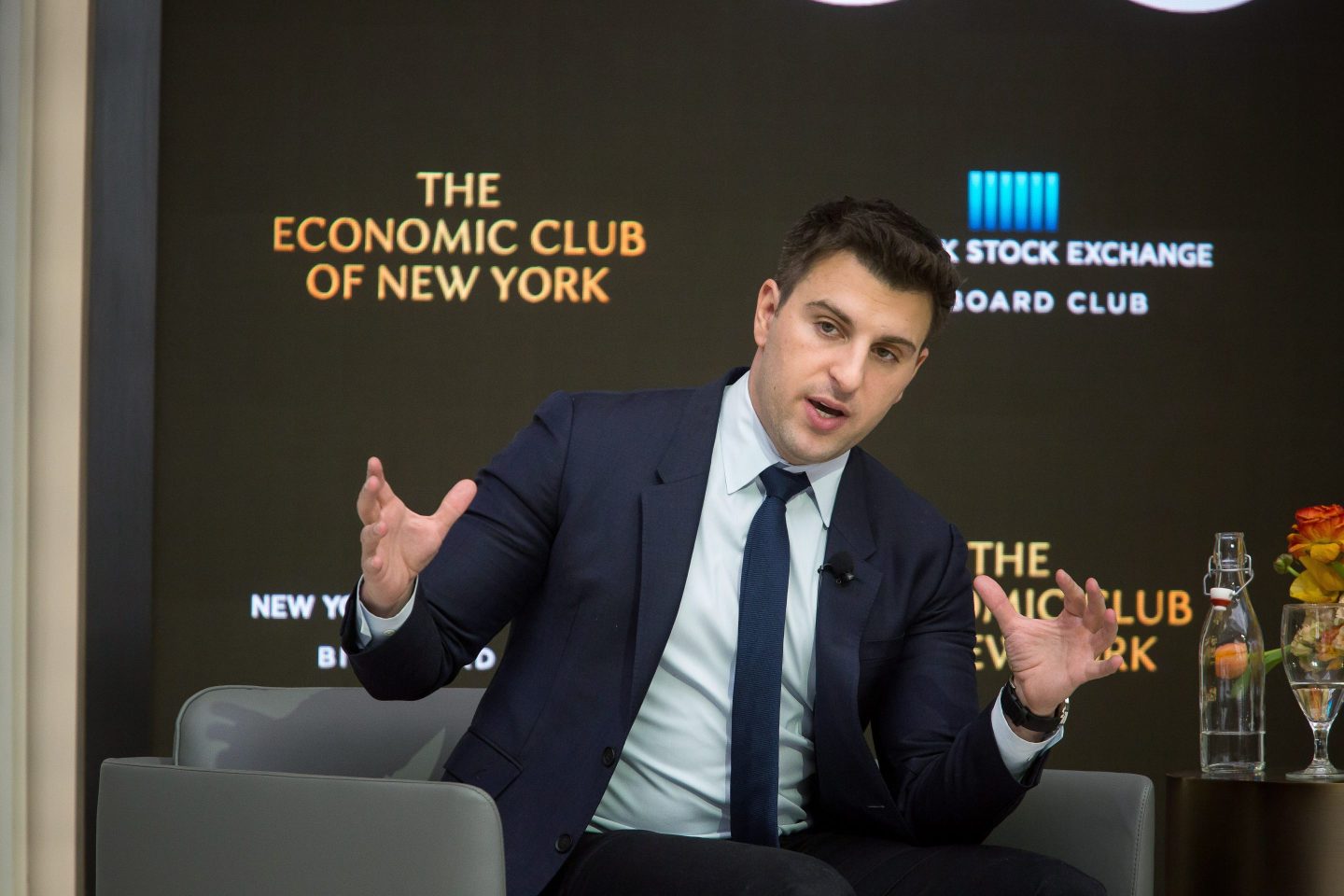 Airbnb CEO Brian Chesky speaks during an Economic Club of New York luncheon at the New York Stock Exchange.