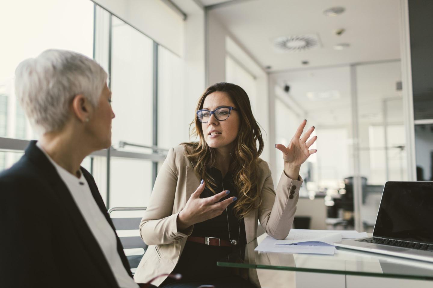 businesswomen in conversation