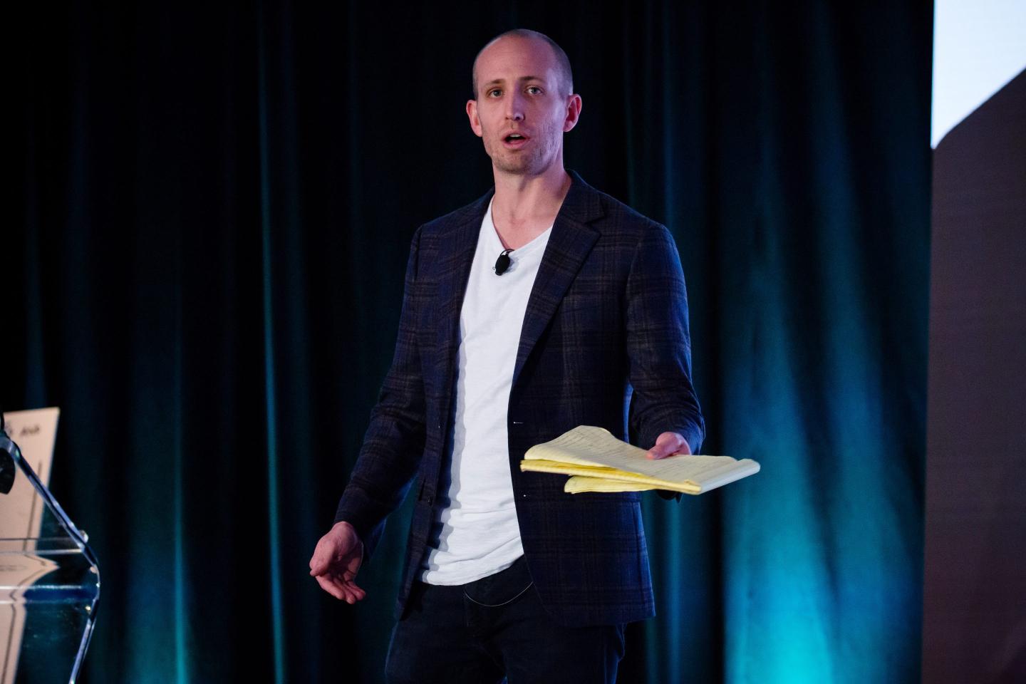 Spencer Bogart speaks at a crypto conference in 2017.
