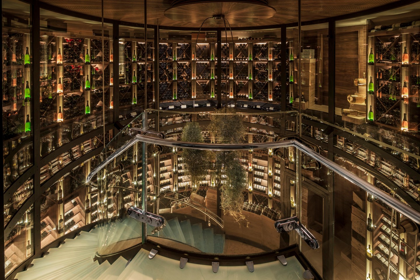 The subterranean wine cellar showcases more than 15,000 bottles of the finest wines from France and beyond.