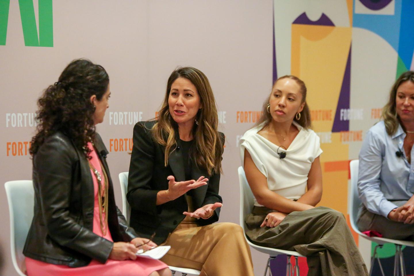 Photo of women speaking at a panel discussion