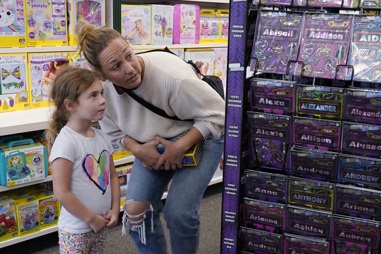 Quinn Byrne, 5 left, shops with her mother, Jamie Byrne, at a Learning Express store in Lake Zurich, Ill., on Sept. 26, 2023.