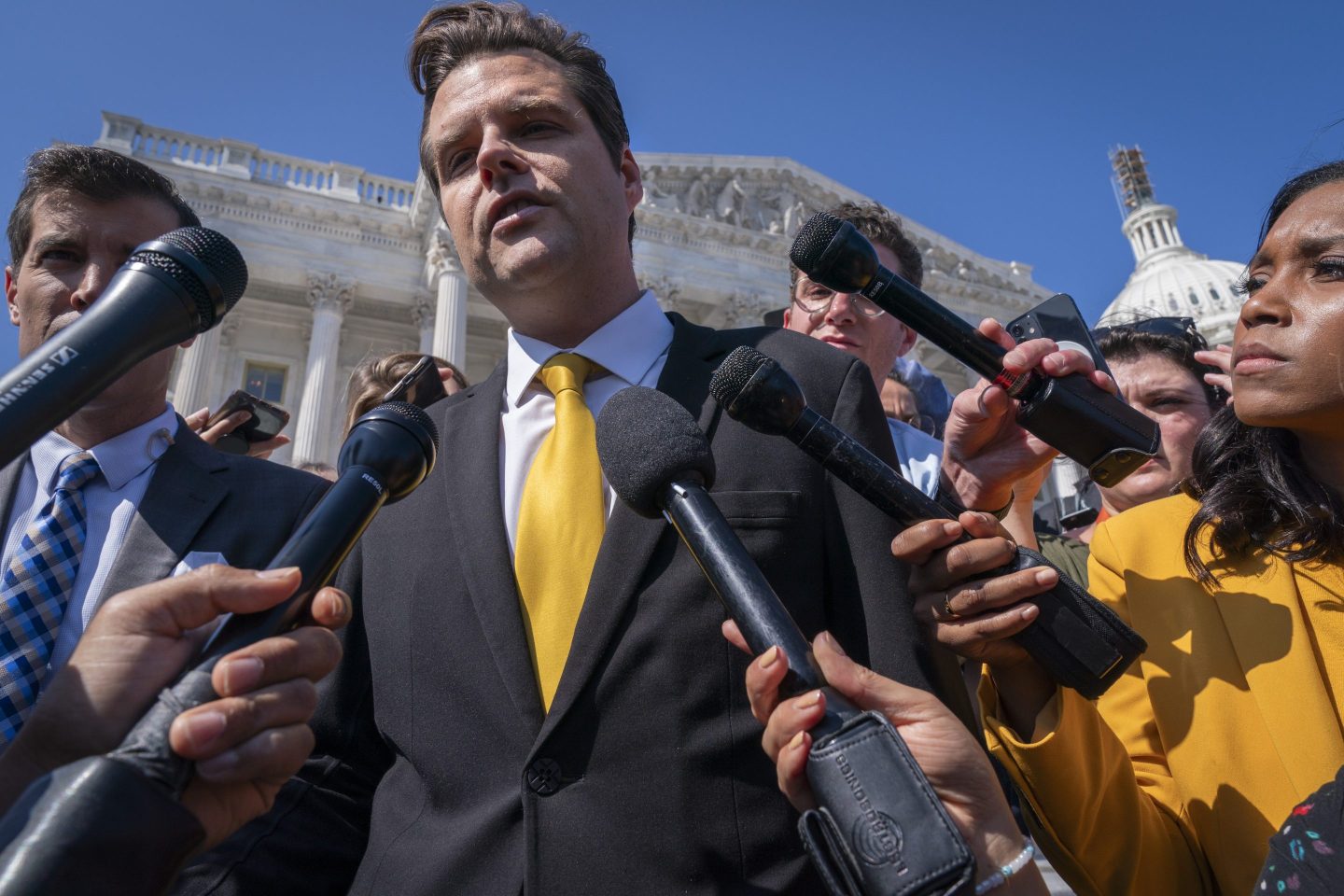 Rep. Matt Gaetz, R-Fla., one of House Speaker Kevin McCarthy's harshest critics, answers questions from members of the media after speaking on the House floor, at the Capitol in Washington, on Oct. 2, 2023.